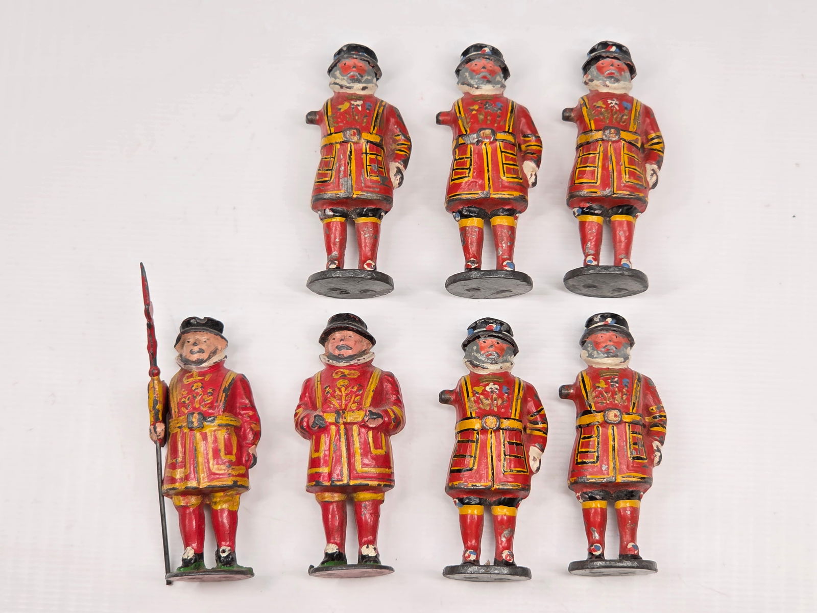 7) VINTAGE LEAD BEEFEATER GUARDS: ALL REMAIN IN FAIR CONDITION, SHOWING PAINT WEAR. 5 MISSING ARM.