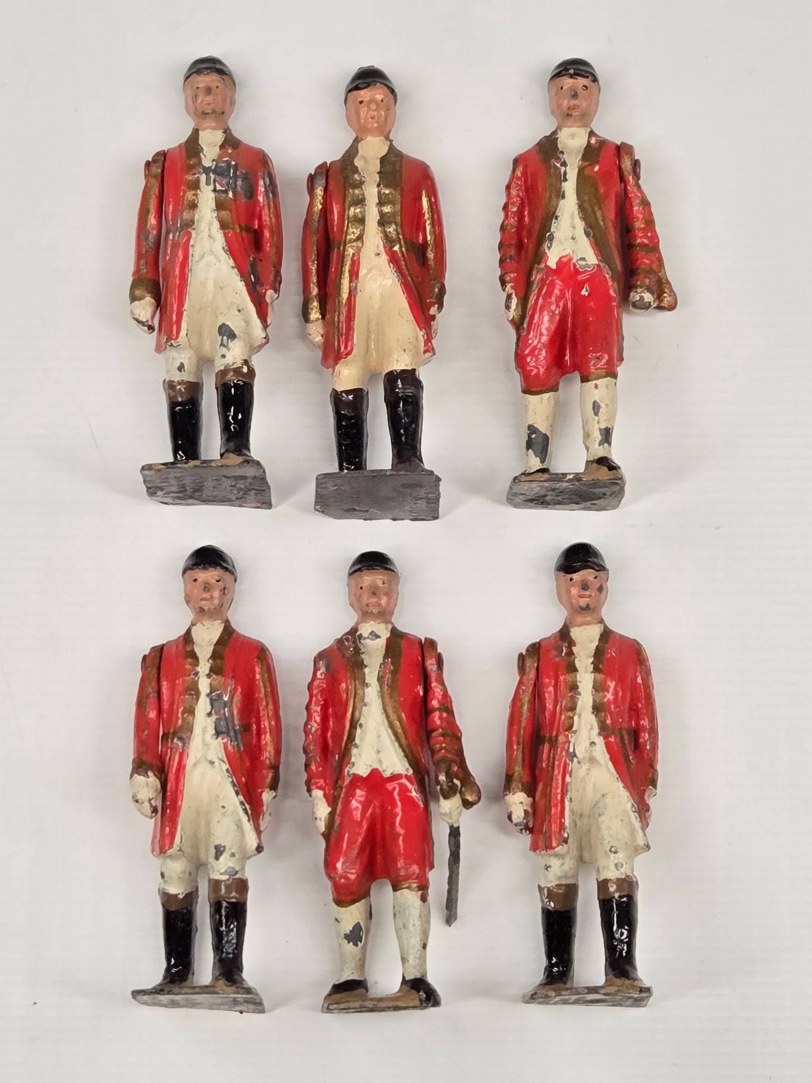 6) VINTAGE BRITAIN FOOTMEN OF THE STATE COACH: ALL REMAIN IN GOOD CONDITION, SHOWING SOME TYPICAL PAINT WEAR.