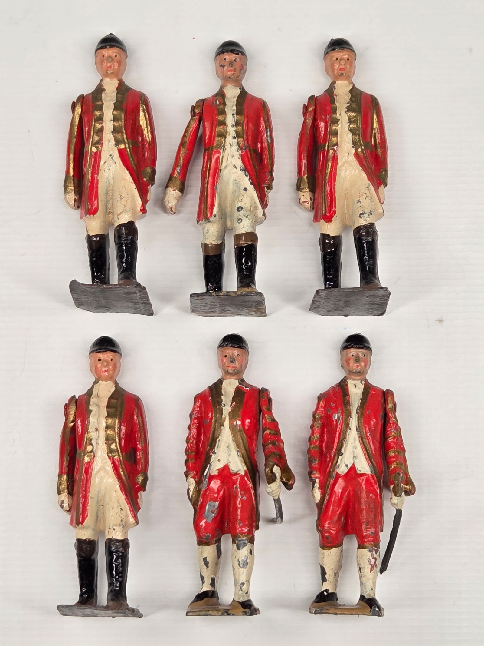 6) VINTAGE BRITAIN FOOTMEN OF THE STATE COACH: ALL REMAIN IN GOOD CONDITION, SHOWING SOME TYPICAL PAINT WEAR.