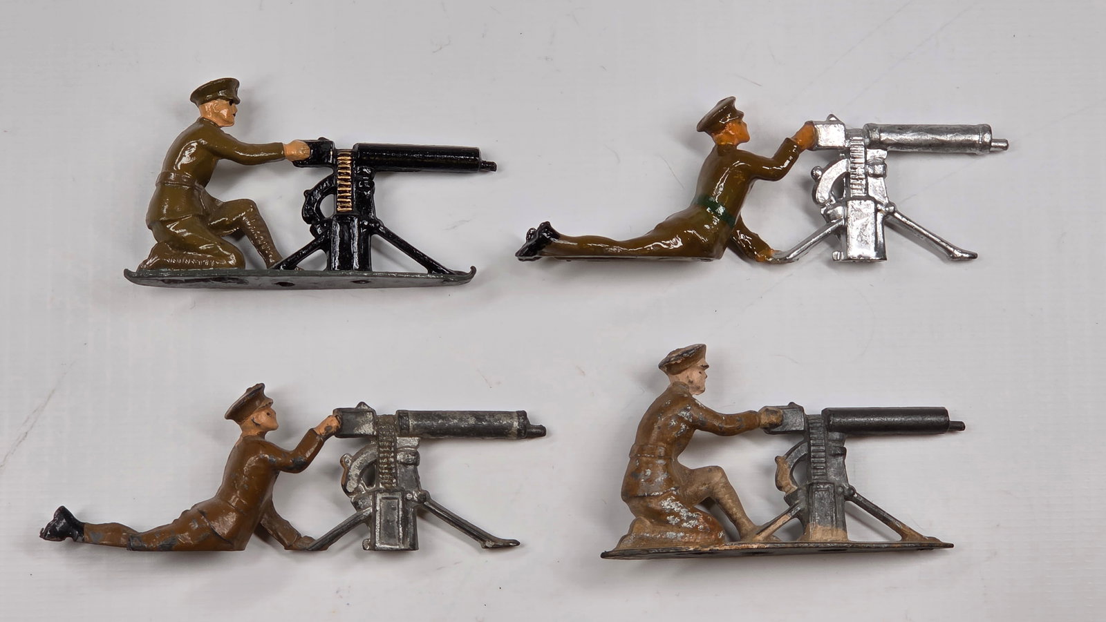 4) VARIOUS VINTAGE LEAD SOLDIER MACHINE GUNNERS (1 of 4)