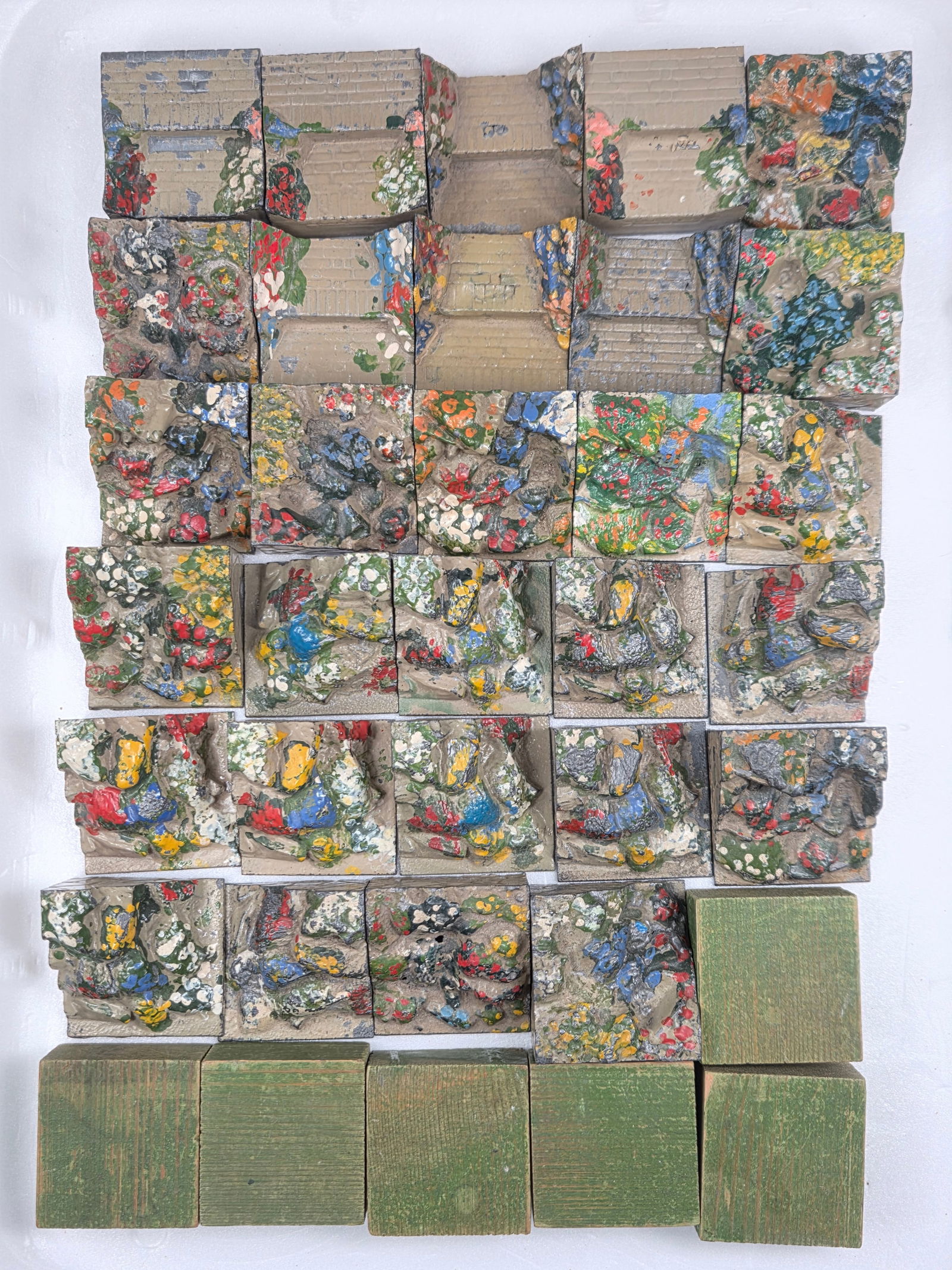 LARGE ASSORTMENT FLORAL PAINTED LEAD GARDEN STEPS: ALL REMAIN IN FAIR TO GOOD CONDITION, SHOWING SOME PAINT WEAR.