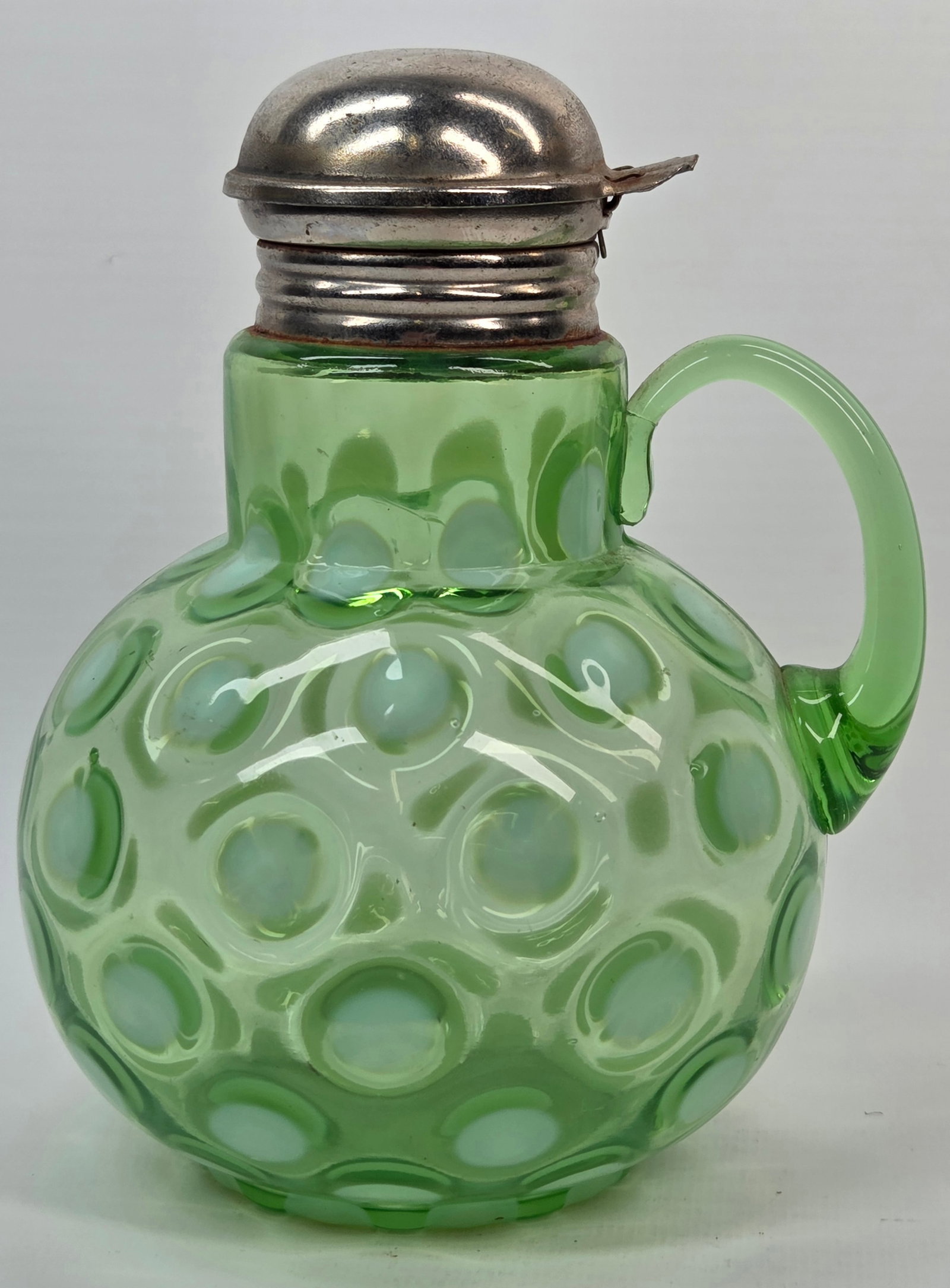 GREEN OPALESCENT COIN SPOT GLASS SYRUP PITCHER: REMAINS IN GOOD CONDITION, SHOWING SOME TYPICAL USAGE WEAR. NO CHIPS OR CRACKS.