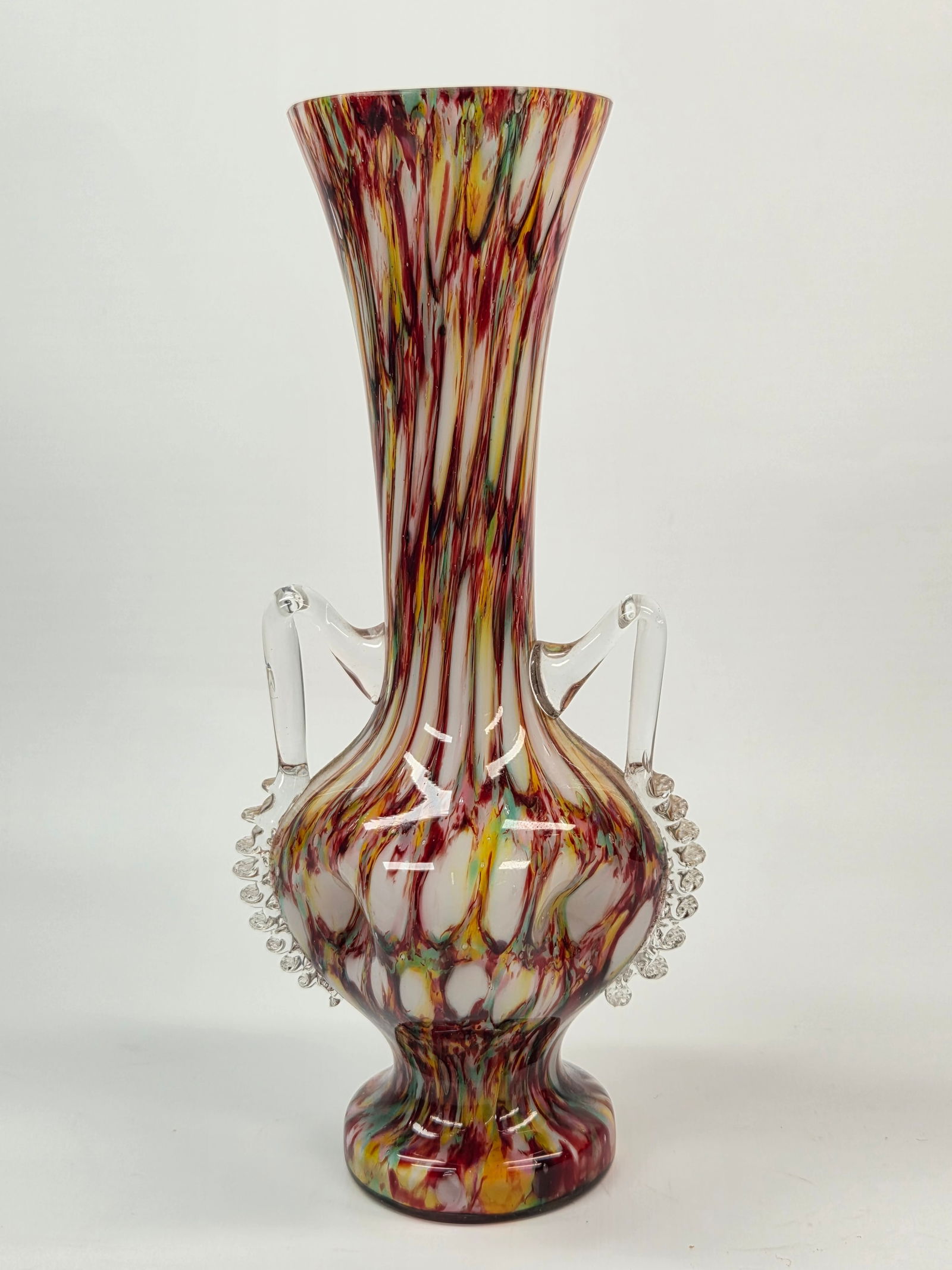 MULTI-COLOR VICTORIAN ART GLASS VASE W/ APPLIED HANDLES: REMAINS IN GOOD CONDITION, SHOWING SOME TYPICAL USAGE WEAR. NO CHIPS OR CRACKS.