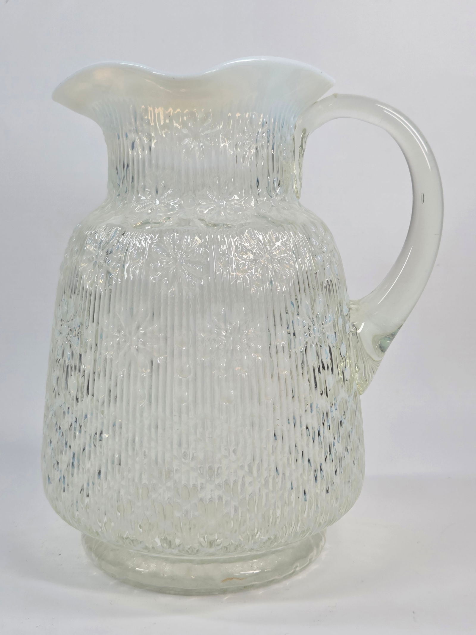 VICTORIAN OPALESCENT DAISY & LATTICE GLASS WATER PITCHER: REMAINS IN GOOD CONDITION, SHOWING SOME TYPICAL USAGE WEAR. NO CHIPS OR CRACKS.