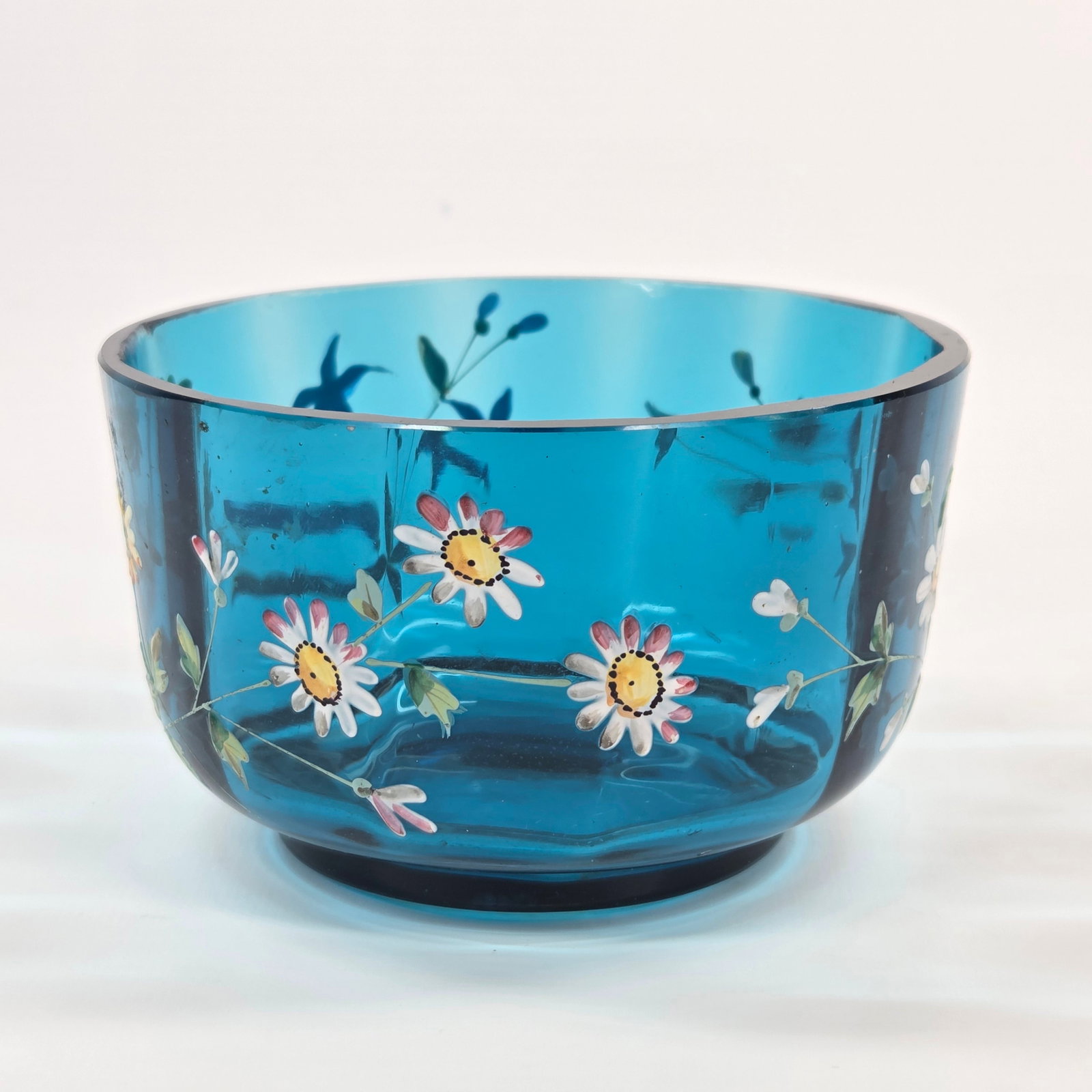 BLUE VICTORIAN HAND PAINTED PANELED GLASS FINGER BOWL: REMAINS IN GOOD CONDITION, SHOWING SOME TYPICAL USAGE WEAR. NO CHIPS OR CRACKS.