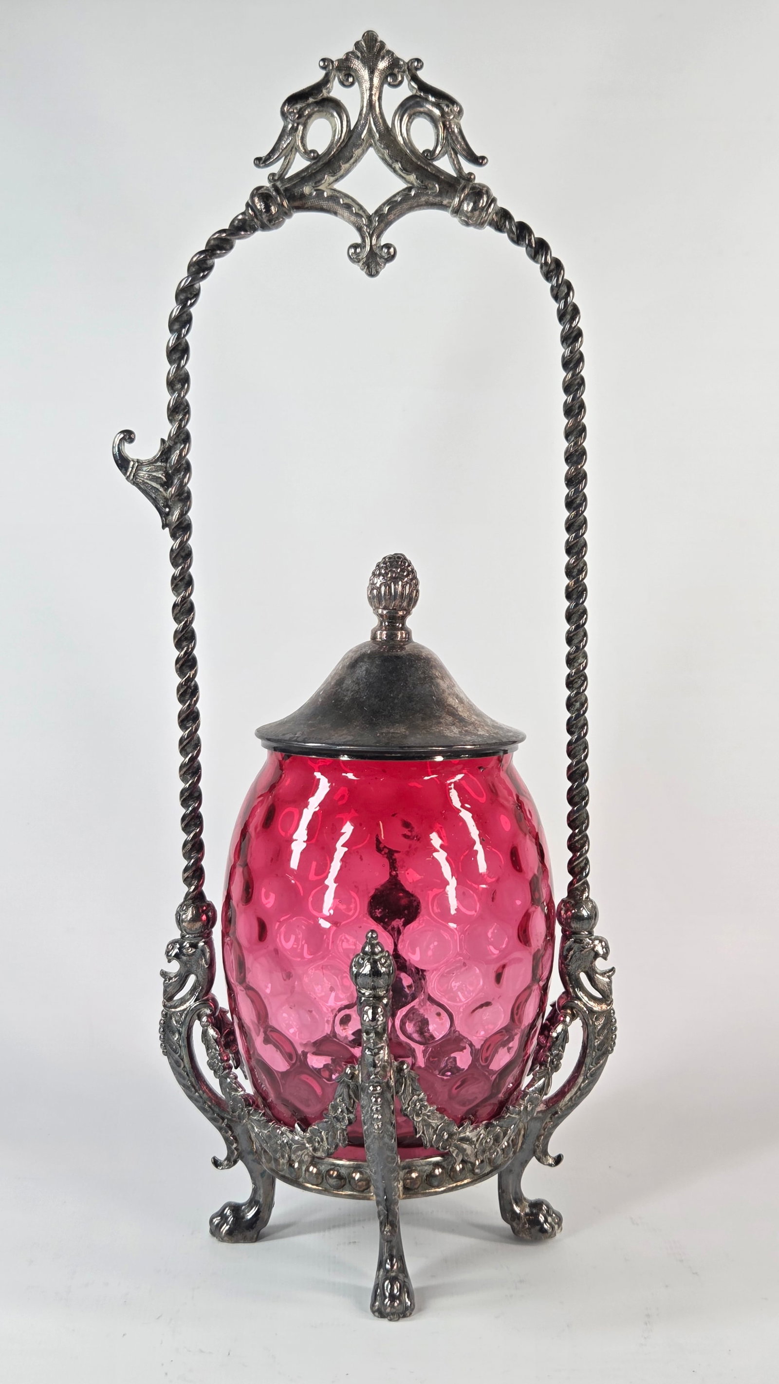 JAMES W. TUFTS QUADRUPLE PLATE PICKLE CASTOR W/ CRANBERRY JAR: REMAINS IN GOOD CONDITION, SHOWING SOME TYPICAL USAGE WEAR. NO CHIPS OR CRACKS. NEEDS POLISHED.