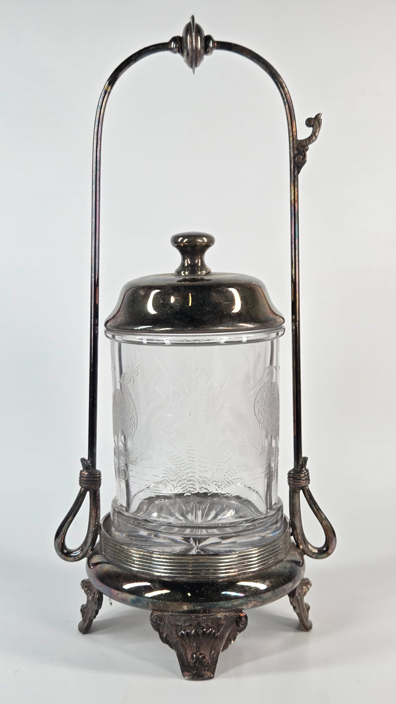 MERIDEN SILVER PLATE PICKLE CASTOR W/ HERON GLASS: REMAINS IN GOOD CONDITION, SHOWING SOME TYPICAL USAGE WEAR. NO CHIPS OR CRACKS. NEEDS POLISHED.