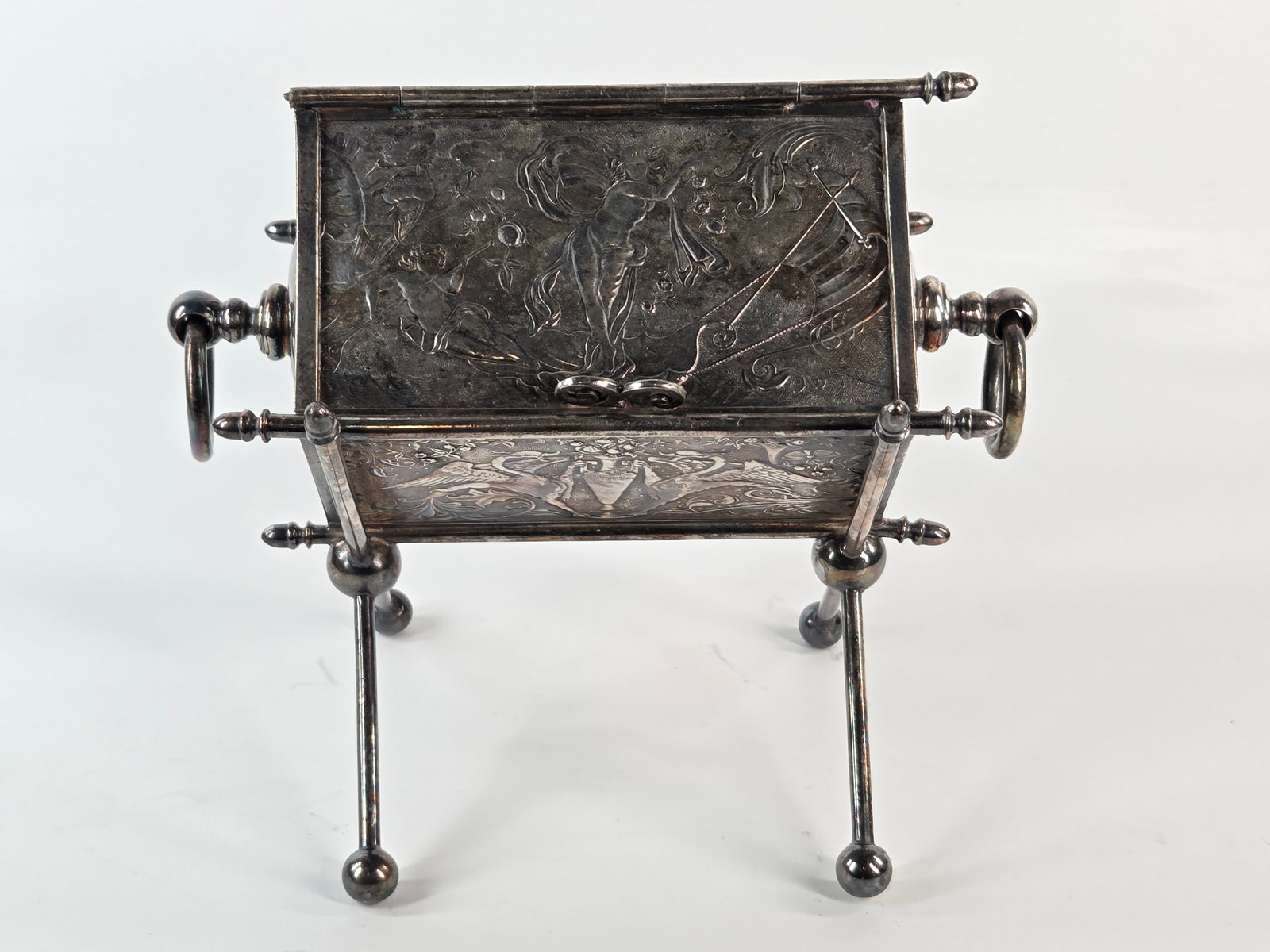 19TH CENTURY EUROPEAN ORNATE SEWING ETUI / JEWELRY CASKET BOX: REMAINS IN OVERALL GOOD CONDITION, SHOWING SOME TYPICAL USAGE WEAR. ART NOUVEAU ENGRAVED FIGURES & GRIFFINS. ONE OF THE FINIALS ALONG TOP EDGE IS BROKEN OFF AND MISSING. NEEDS POLISHED.