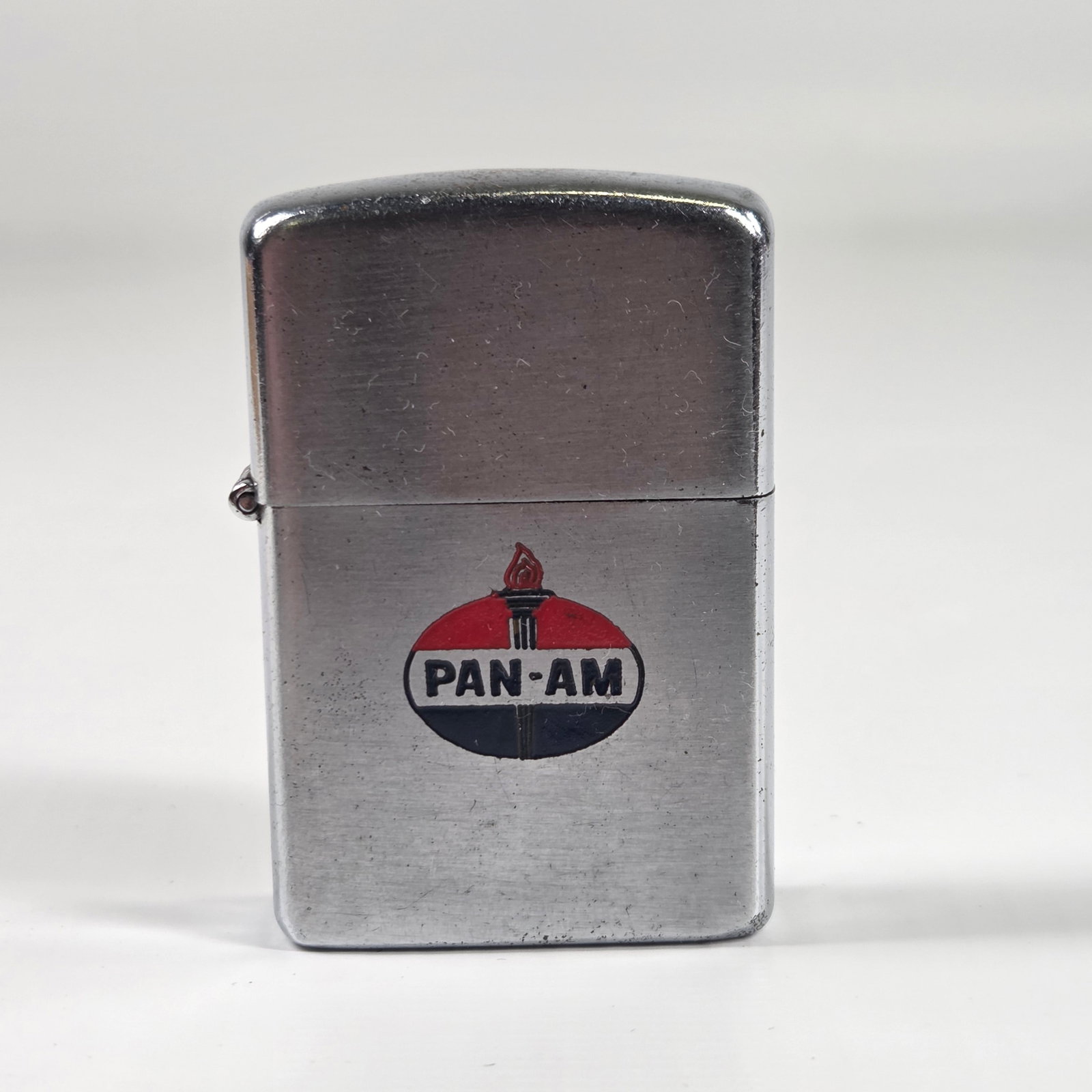 VINTAGE DUNDEE AMOCO ADVERTISING LIGHTER: REMAINS IN GOOD CONDITION, SHOWING SOME TYPICAL USAGE WEAR.