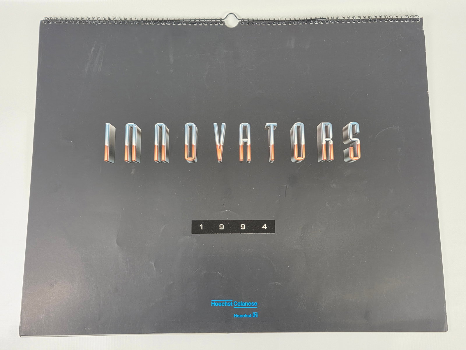 1994 HOECHST CELANESE CALENDAR: REMAINS IN GOOD CONDITION, SHOWING SOME TYPICAL WEAR.