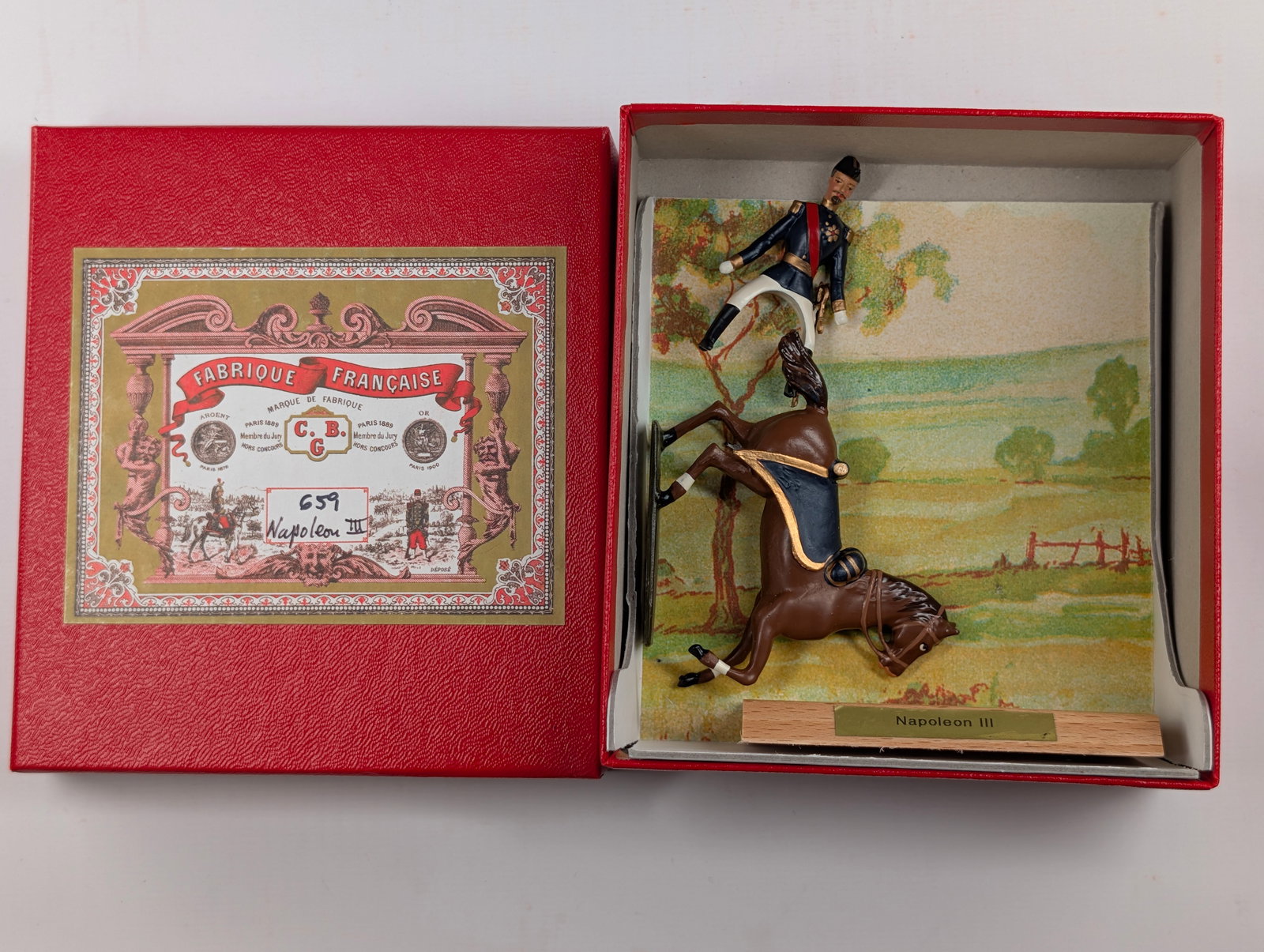 C.B.G. MIGNOT NAPOLEON III LEAD SOLDIER FIGURE W/ HORSE, WOOD STAND FRANCE: REMAINS IN GOOD CONDITION IN BOX.