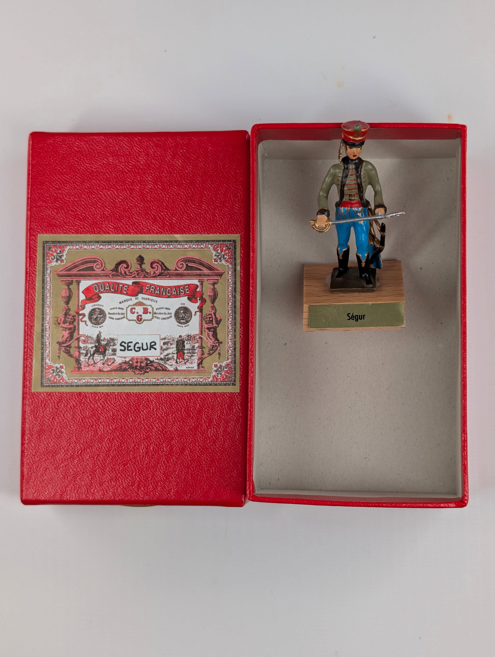 C.B.G. MIGNOT PHILIPPE-PAUL DE SEGUR FIGURE IN BOX W/ WOOD STAND FRANCE: REMAINS IN GOOD CONDITION IN BOX.