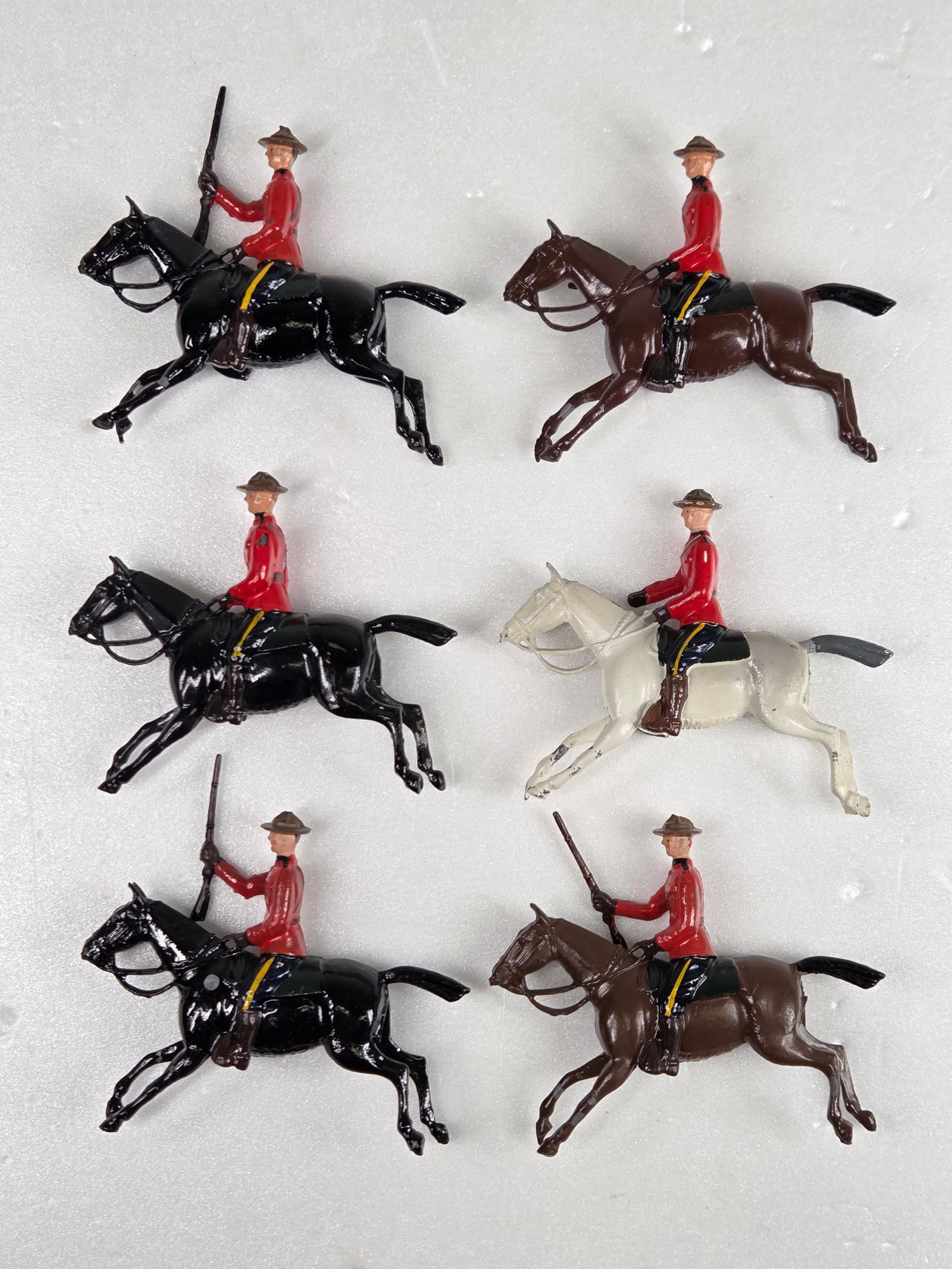 6) ROYAL CANADIAN MOUNTED POLICE ON HORSEBACK: FIGURES REMAIN IN GOOD CONDITION WITH SOME WEAR