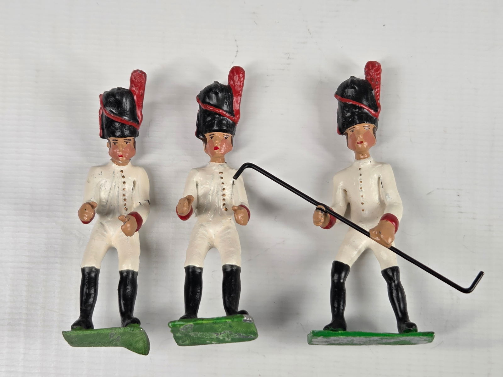 SET OF 3 HAND PAINTED LEAD SOLDIERS: ALL REMAIN IN FAIR TO GOOD CONDITION, SHOWING SOME TYPICAL WEAR.