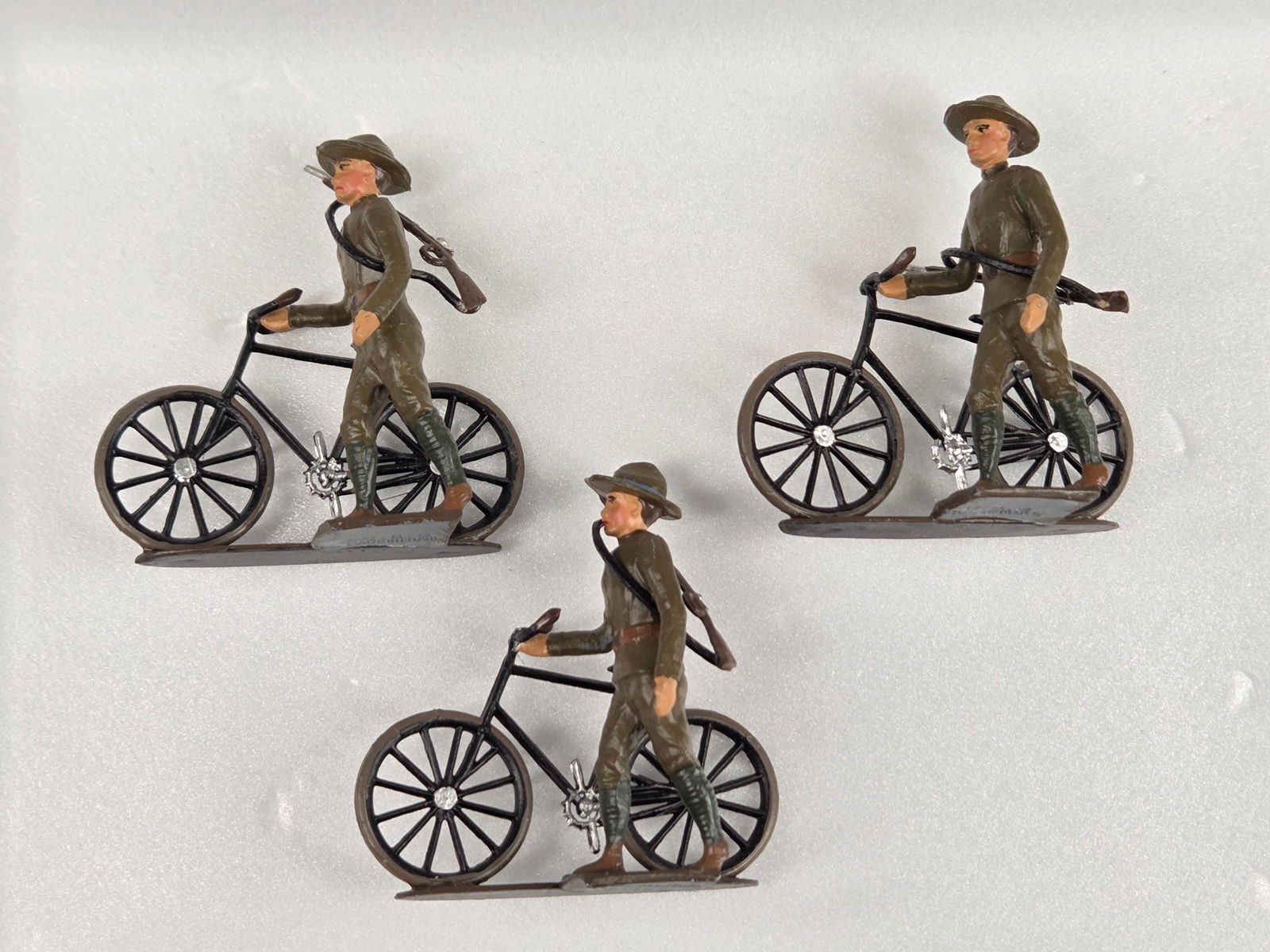 FRENCH C.B.G. LEAD SOLDIERS ON BICYCLE: ALL REMAIN IN GOOD CONDITION, SHOWING SOME TYPICAL WEAR.