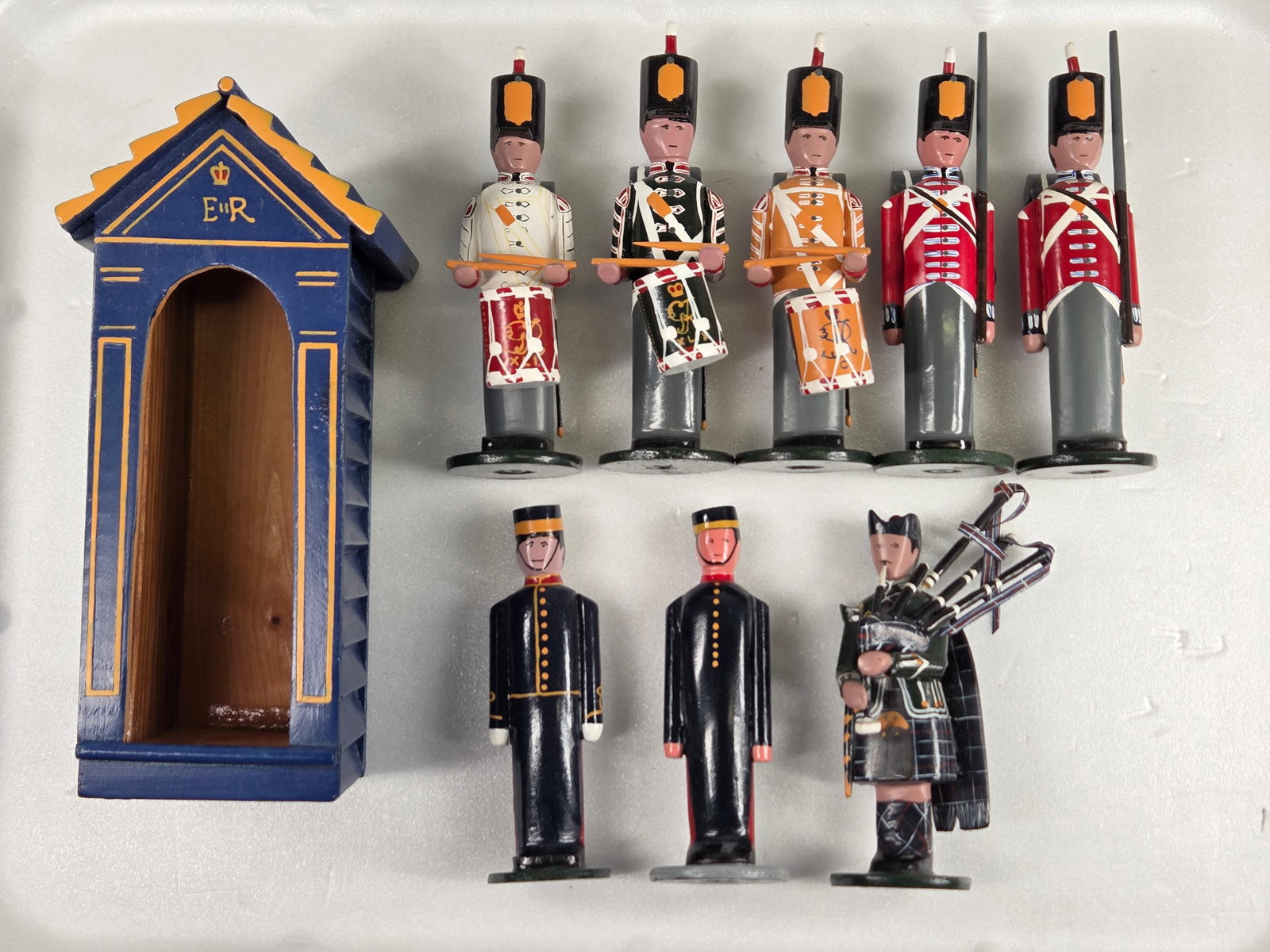 HAND PAINTED WOOD TOY SOLDIERS: ALL REMAIN IN GOOD CONDITION.