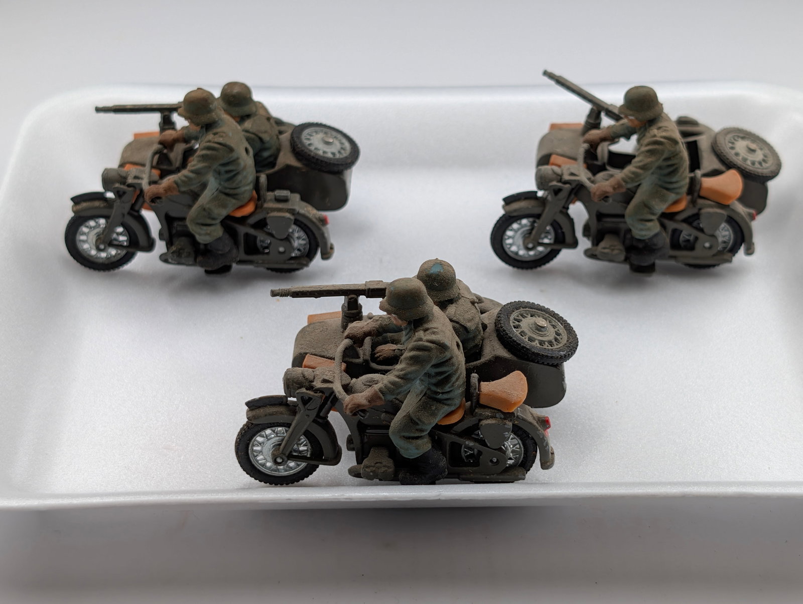 3) VINTAGE BRITAINS LTD GERMAN B.M.W. MOTORCYCLES: ALL REMAIN IN GOOD CONDITION. DUSTY, NEEDING CLEANED.
