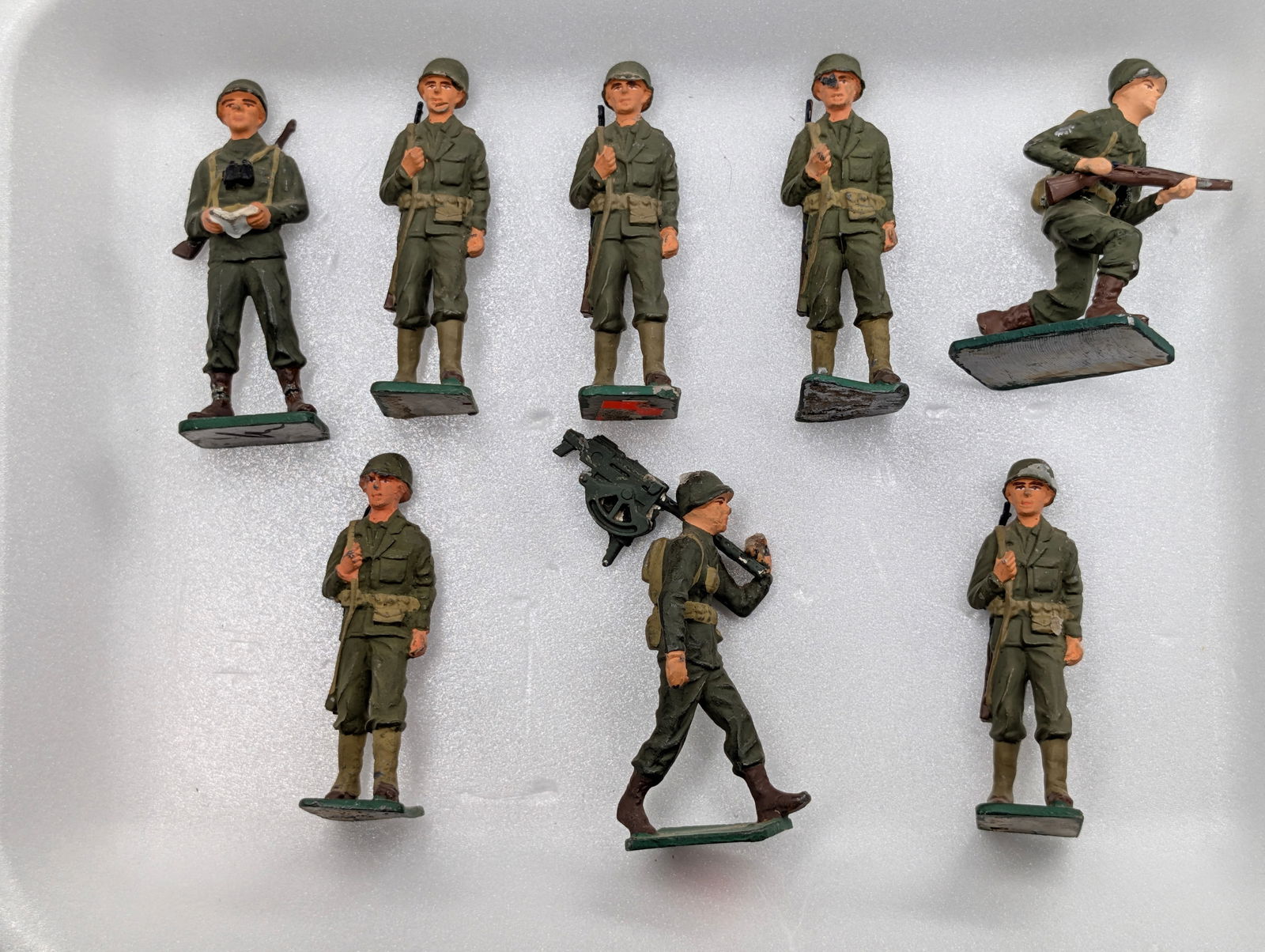 8) UNMARKED HAND PAINTED LEAD SOLDIERS: ALL REMAIN IN GOOD CONDITION, SHOWING SOME TYPICAL PAINT WEAR.