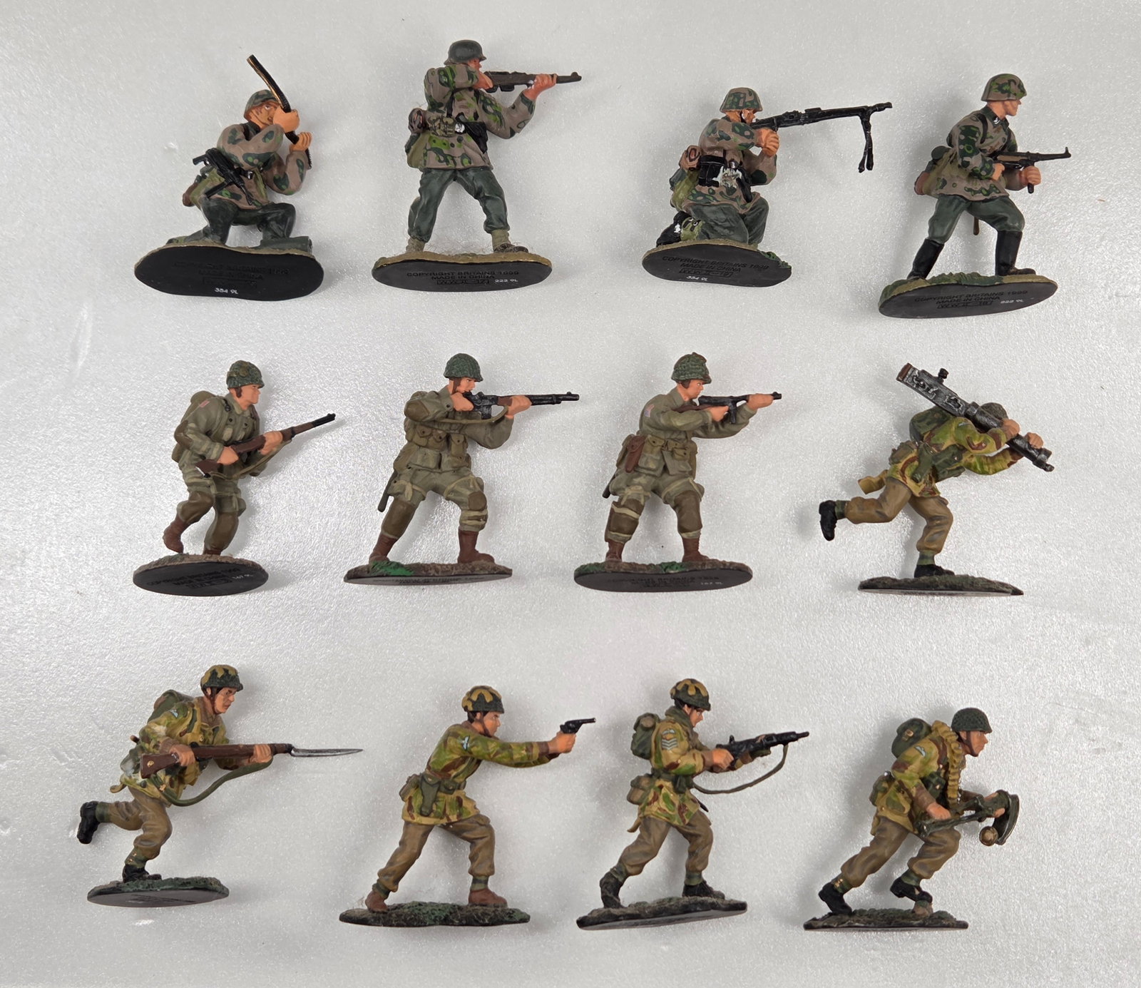 12) MODERN BRITAINS SOLDIERS: ALL REMAIN IN GOOD CONDITION. DUSTY, NEEDING CLEANED.