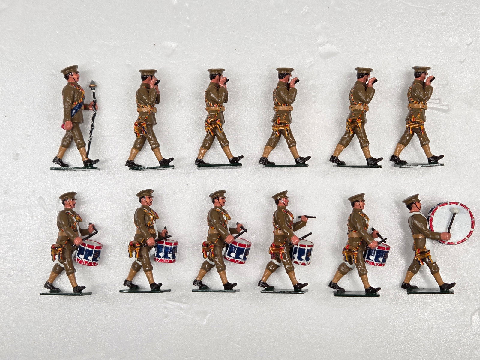 SET OF 12 FUS. MIN. LEAD MARCHING BAND SOLDIERS: ALL REMAIN IN VERY GOOD CONDITION.