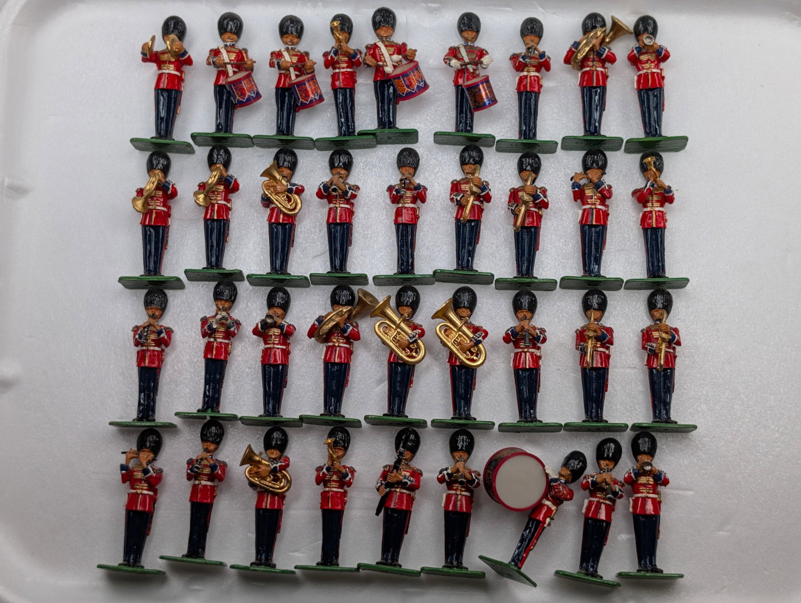 SET OF 36 W. BRITAIN 1999 GUARD BAND: ALL REMAIN IN GOOD CONDITION, SHOWING SOME TYPICAL WEAR.