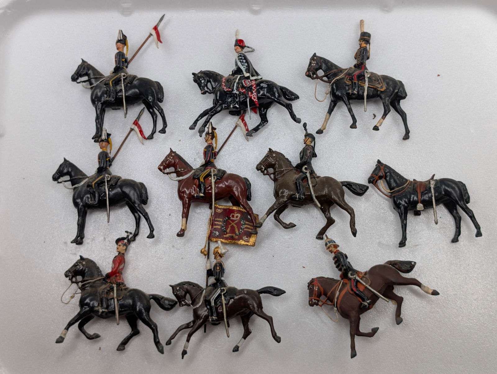 10) VARIOUS VINTAGE MOUNTED BRITAIN SOLDIERS: ALL REMAIN IN GOOD CONDITION, SHOWING SOME TYPICAL WEAR. DUSTY, NEEDING CLEANED.