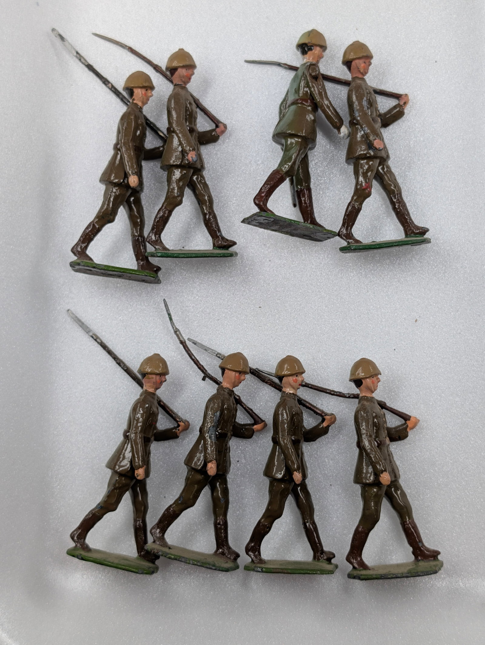SET OF 8 VINTAGE BRITAIN SOLDIERS: ALL REMAIN IN GOOD CONDITION, SHOWING SOME TYPICAL WEAR. DUSTY, NEEDING CLEANED.