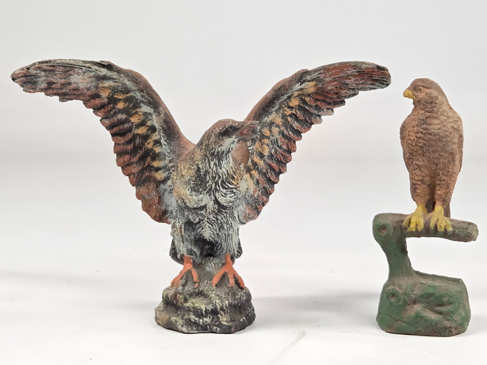 2) ANTIQUE GERMAN COMPOSITION BIRDS: BOTH REMAIN IN GOOD CONDITION. HAWK ON BRANCH SHOWING SOME CRACKS.