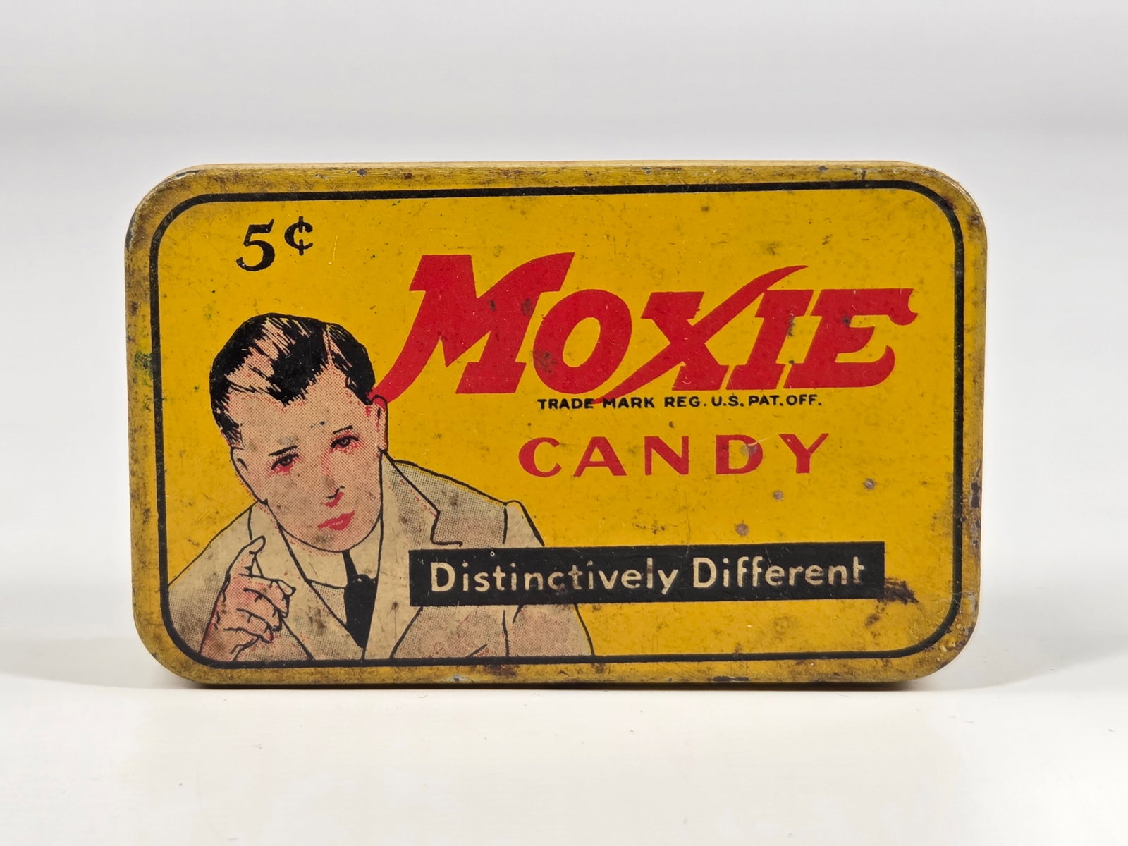 ANTIQUE MOXIE CANDY ADVERTISING TIN: REMAINS IN FAIR TO GOOD CONDITION, SHOWING SOME TYPICAL WEAR.