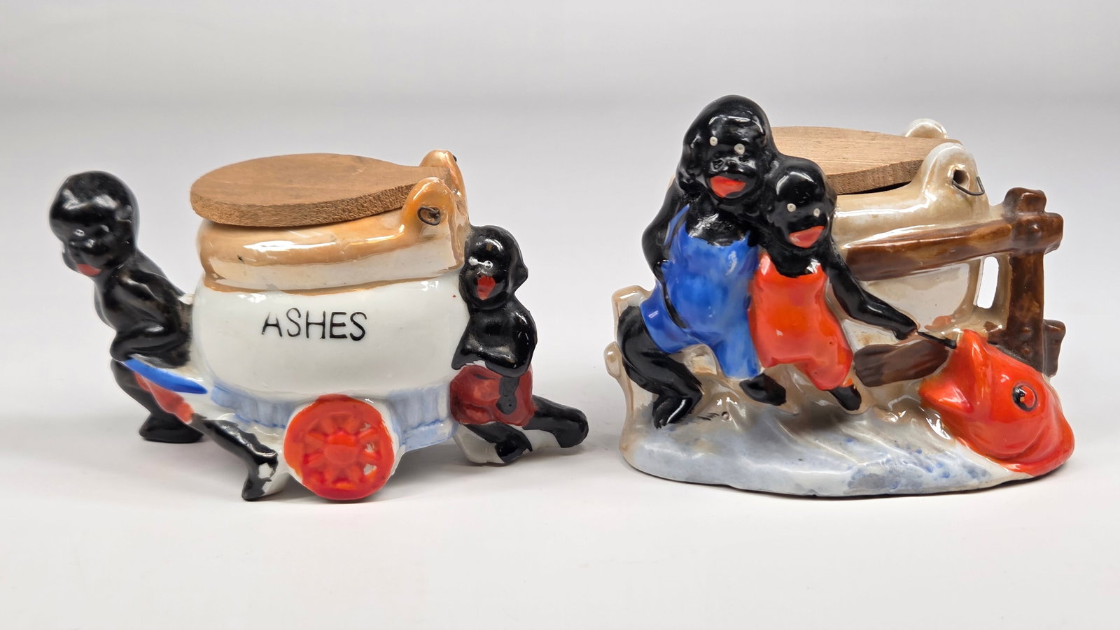 2) VINTAGE JAPAN BISQUE BLACK AMERICANA ASHTRAYS: BOTH REMAIN IN GOOD CONDITION. NO CHIPS OR CRACKS.