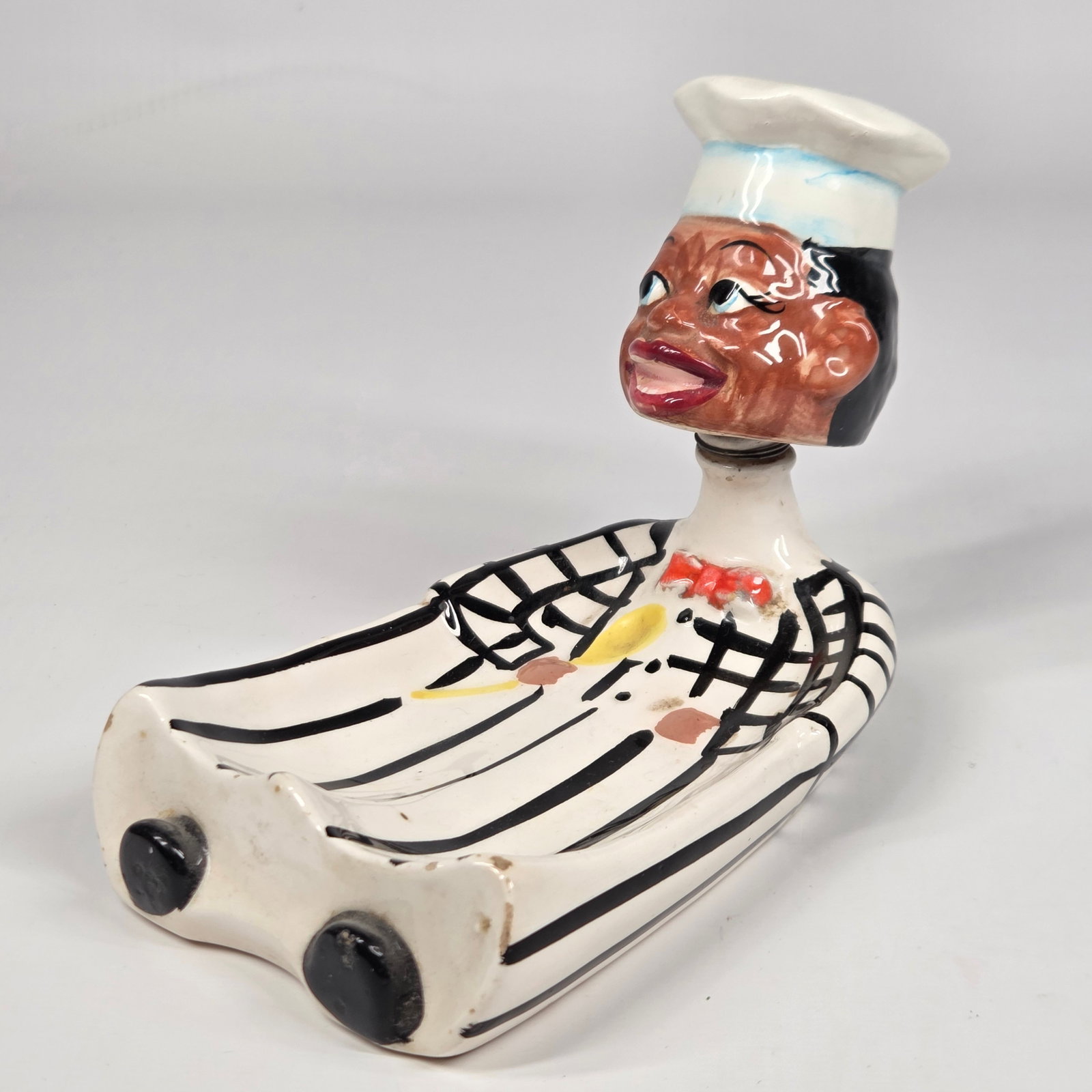 BLACK AMERICANA CERAMIC NODDER SPOON REST: REMAINS IN GOOD CONDITION, NO CHIPS OR CRACKS.