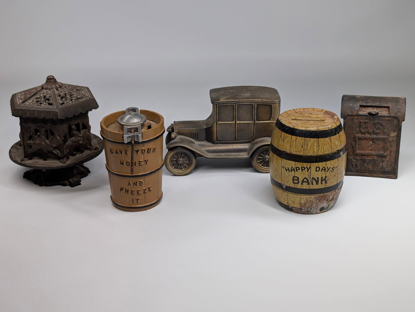 5) VARIOUS COLLECTIBLE STILL BANKS: ALL REMAIN IN FAIR TO GOOD CONDITION, SHOWING SOME TYPICAL WEAR.