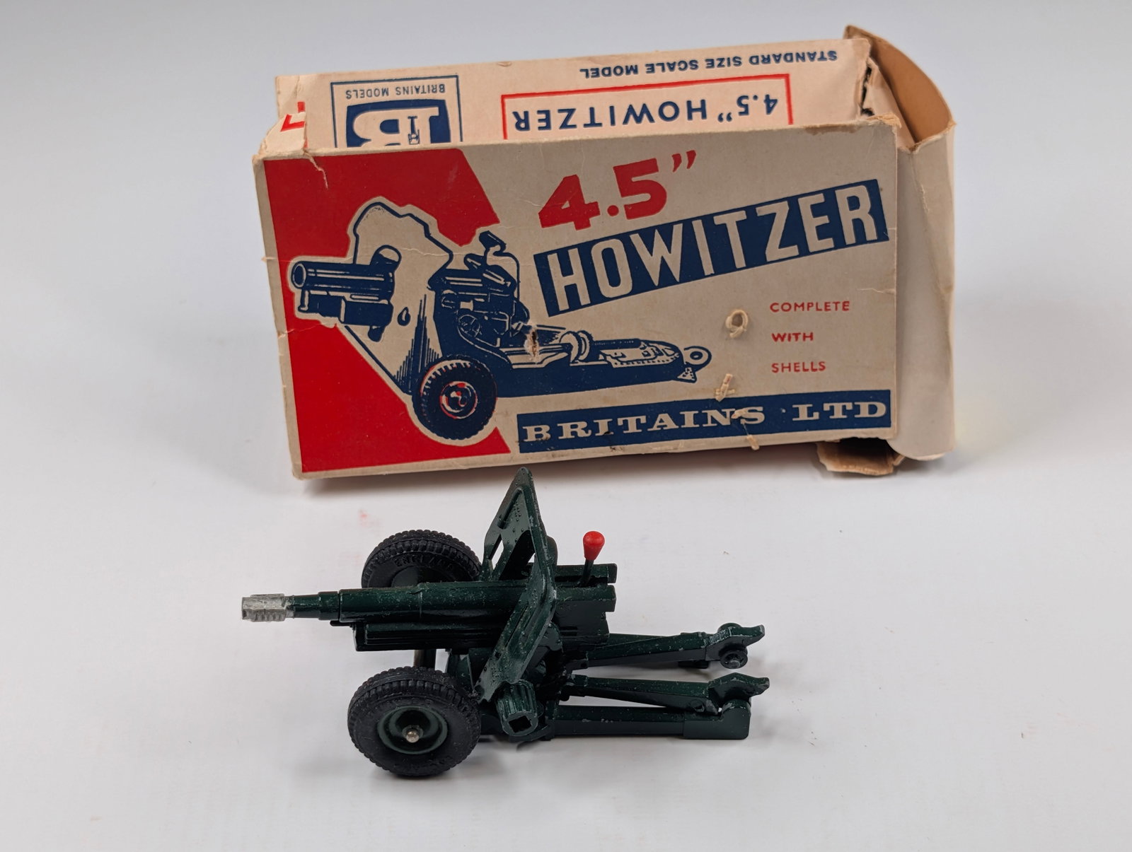 VINTAGE BRITAINS LTD 4.5" HOWITZER W/ BOX: REMAINS IN GOOD CONDITION WITH ORIGINAL BOX. BOX SHOWING WEAR WITH TEARS.
