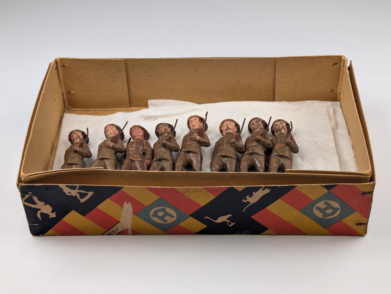 SET OF 8 GERMAN ELASTOLIN SOLDIERS W/ BOX: ALL REMAIN IN FAIR CONDITION, SHOWING WEAR TO RIFLES.