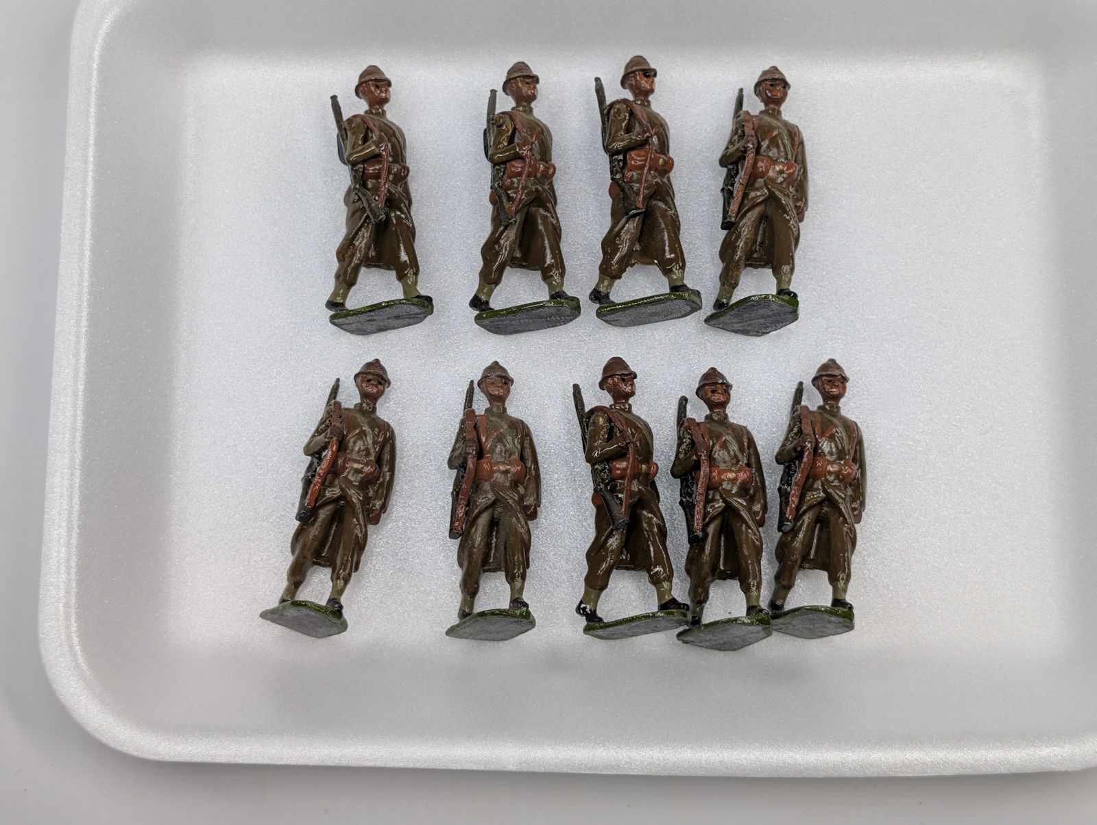 SET OF 9 VINTAGE HAND PAINTED LEAD SOLDIERS: ALL REMAIN IN GOOD CONDITION, SHOWING SOME TYPICAL PAINT WEAR.