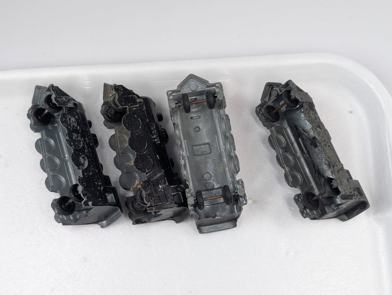 4) MIDGETOY TRAIN ENGINES: ALL REMAIN IN FAIR TO GOOD CONDITION, SHOWING SOME TYPICAL WEAR.