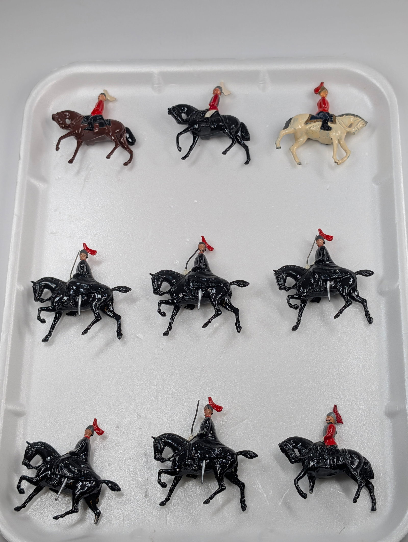 9) VINTAGE BRITAIN MOUNTED LANCERS: ALL REMAIN IN FAIR TO GOOD CONDITION, SHOWING SOME TYPICAL WEAR. TWO HORSES WITH BROKEN LEG.