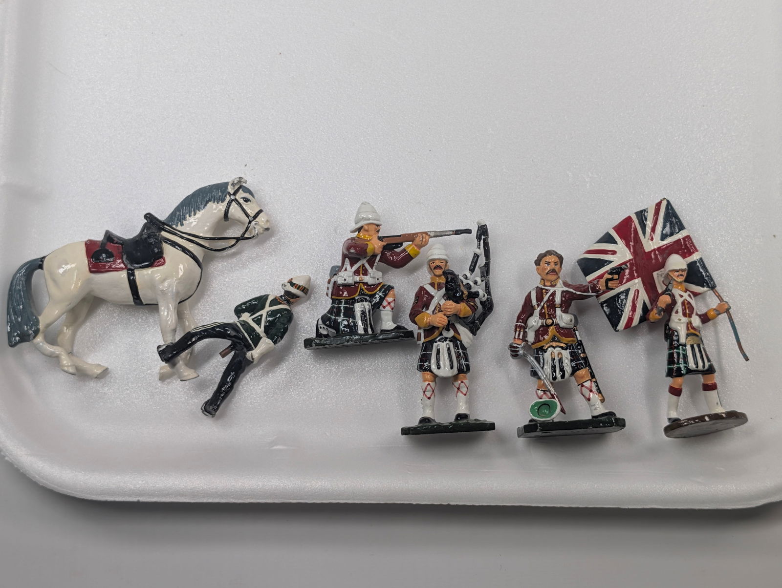 SET OF 6 HAND PAINTED LEAD SOLDIERS: ALL REMAIN IN GOOD CONDITION. HORSE SHOWS BENT LEGS.