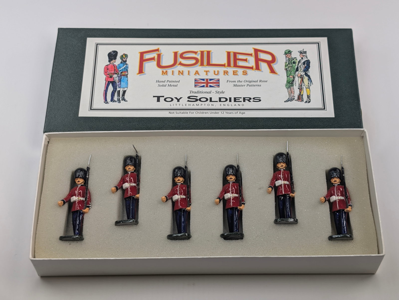 FUSILIERS MINIATURES CHARGING SOLDIERS: SET REMAINS IN VERY GOOD CONDITION WITH BOX.