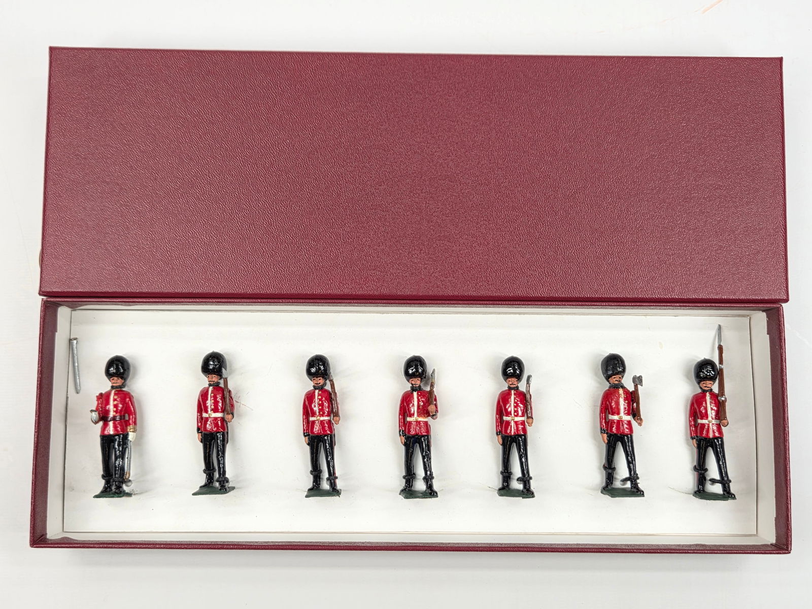 SET OF 7 UNMARKED HAND PAINTED LEAD SOLDIERS: ALL REMAIN IN FAIR TO GOOD CONDITION, SHOWING PAINT WEAR. ONE SOLDIER WITH BROKEN SWORD.