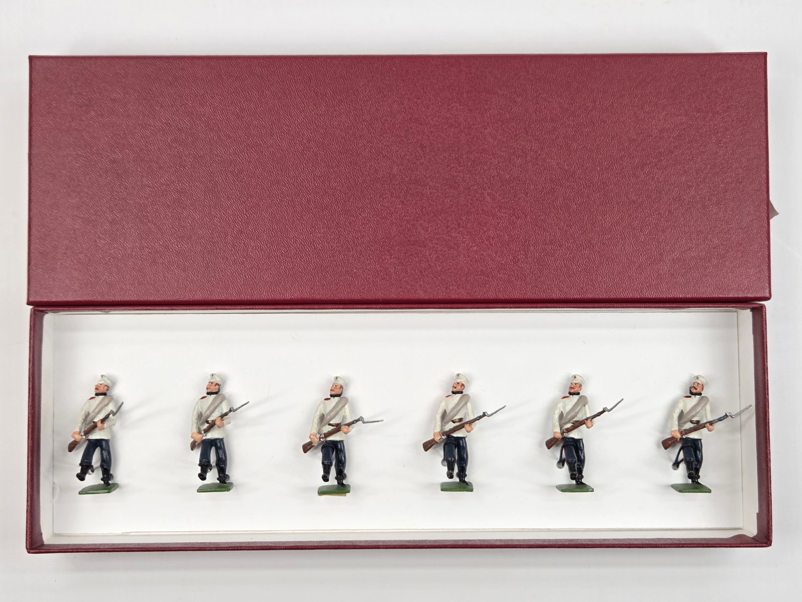 UNMARKED SET OF 6 HAND PAINTED POLISH SOLDIERS: ALL REMAIN IN GOOD CONDITION, SHOWING SOME LIGHT WEAR.