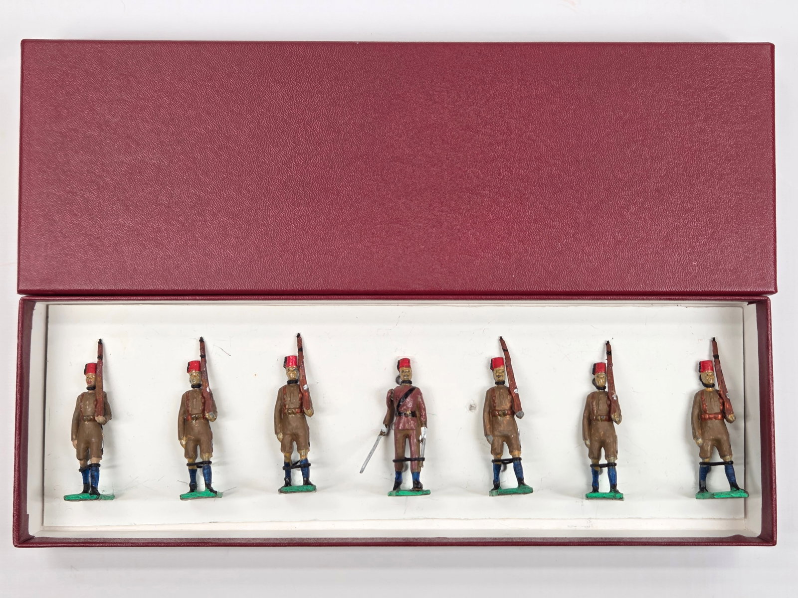 UNMARKED SET OF 7 HAND PAINTED SOLDIERS: ALL REMAIN IN FAIR CONDITION, SHOWING POOR PAINTING.