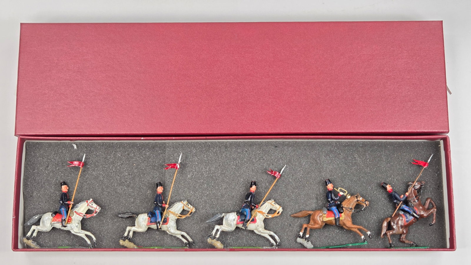 SET OF 5 UNMARKED HAND PAINTED MOUNTED SOLDIERS: ALL REMAIN IN GOOD CONDITION, SHOWING SOME TYPICAL WEAR.