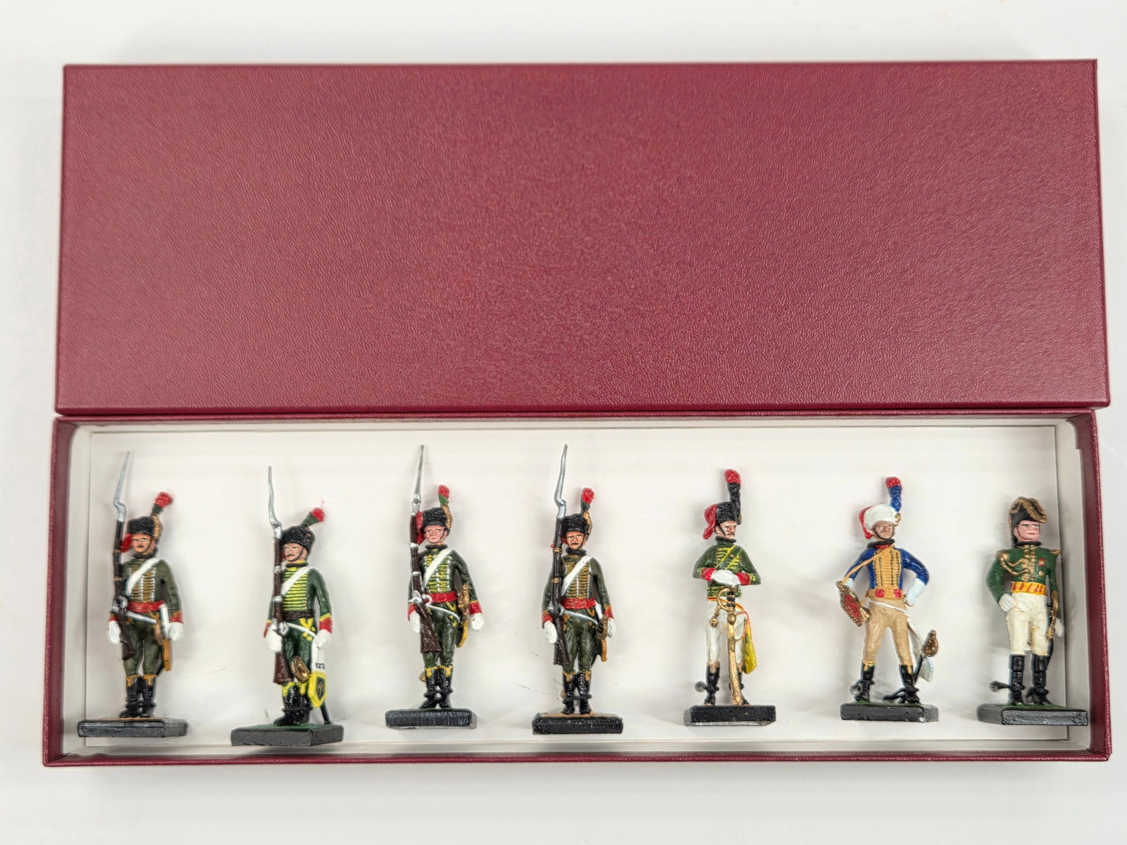 SET OF 7 ALYMER HAND PAINTED SOLDIERS: ALL REMAIN IN GOOD CONDITION, SHOWING SOME TYPICAL WEAR.