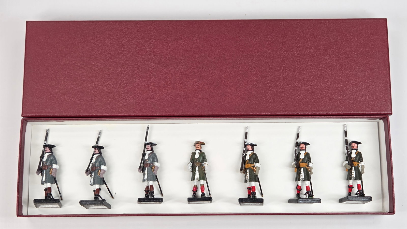 SET OF 7 ALYMER HAND PAINTED SOLDIERS: ALL REMAIN IN GOOD CONDITION, SHOWING SOME TYPICAL WEAR.