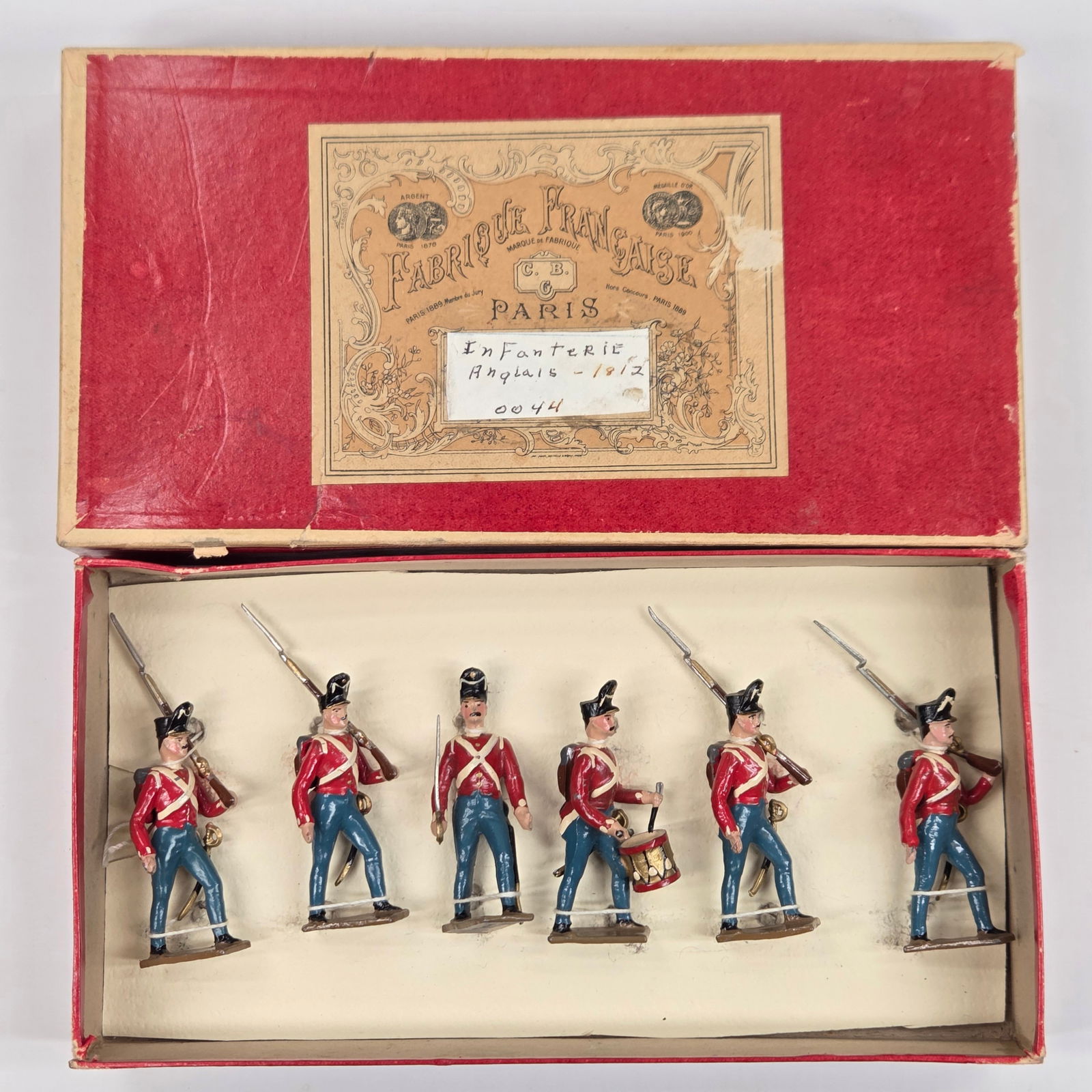 C.B.G. HAND PAINTED SOLDIER INFANTRY SET W/ BOX: SOLDIERS ALL REMAIN IN VERY GOOD CONDITION. CARDBOARD INSERT MADE. ORIGINAL BOX REMAINS NICE, SHOWING SOME WEAR.