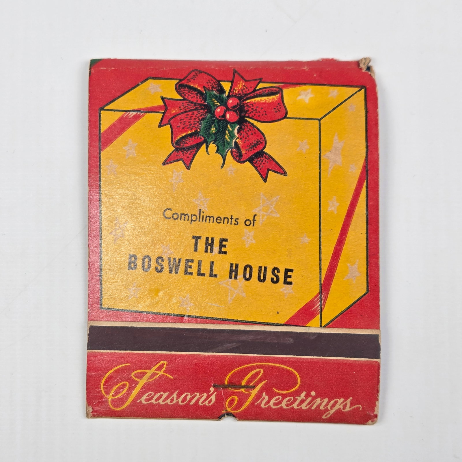 LARGE ADVERTISING SANTA CLAUS FEATURE MATCHBOOK: REMAINS IN GOOD CONDITION, SHOWING SOME TYPICAL WEAR. MISSING SOME MATCHES.