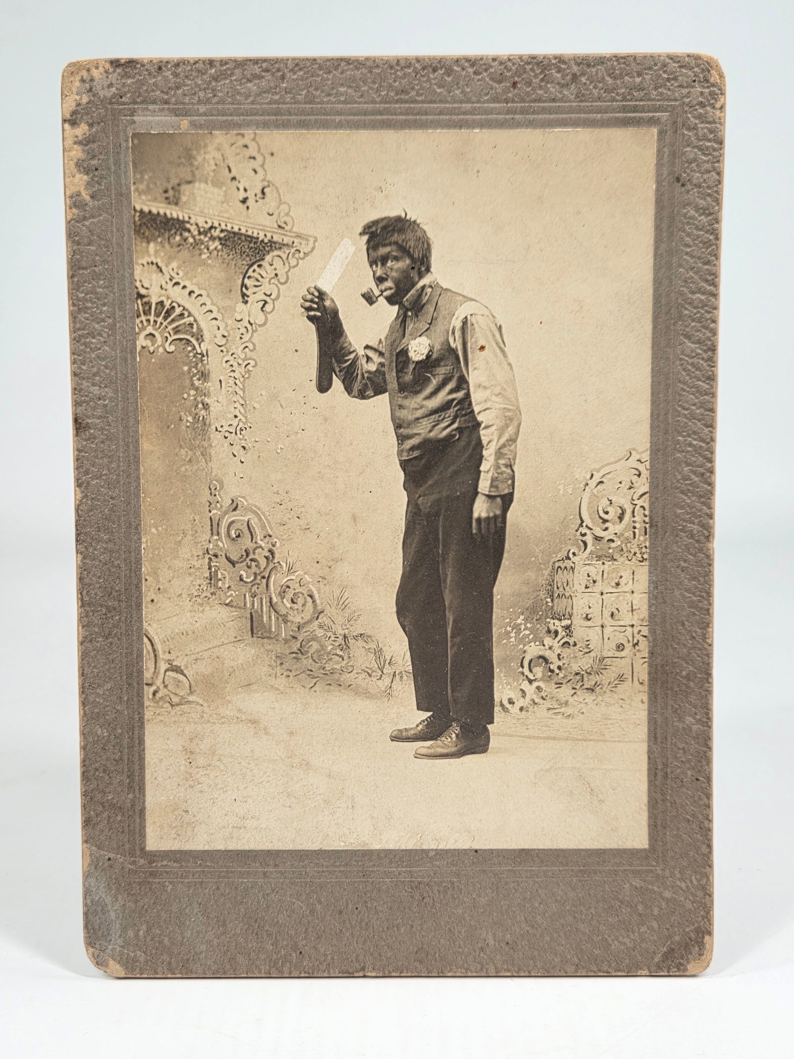 ANTIQUE PHOTOGRAPH BLACK AMERICANA W/ LARGE STRAIGHT RAZOR: IMAGE REMAINS IN GOOD CONDITION, SHOWING SOME LIGHT WEAR. MATTE SHOWING WEAR.