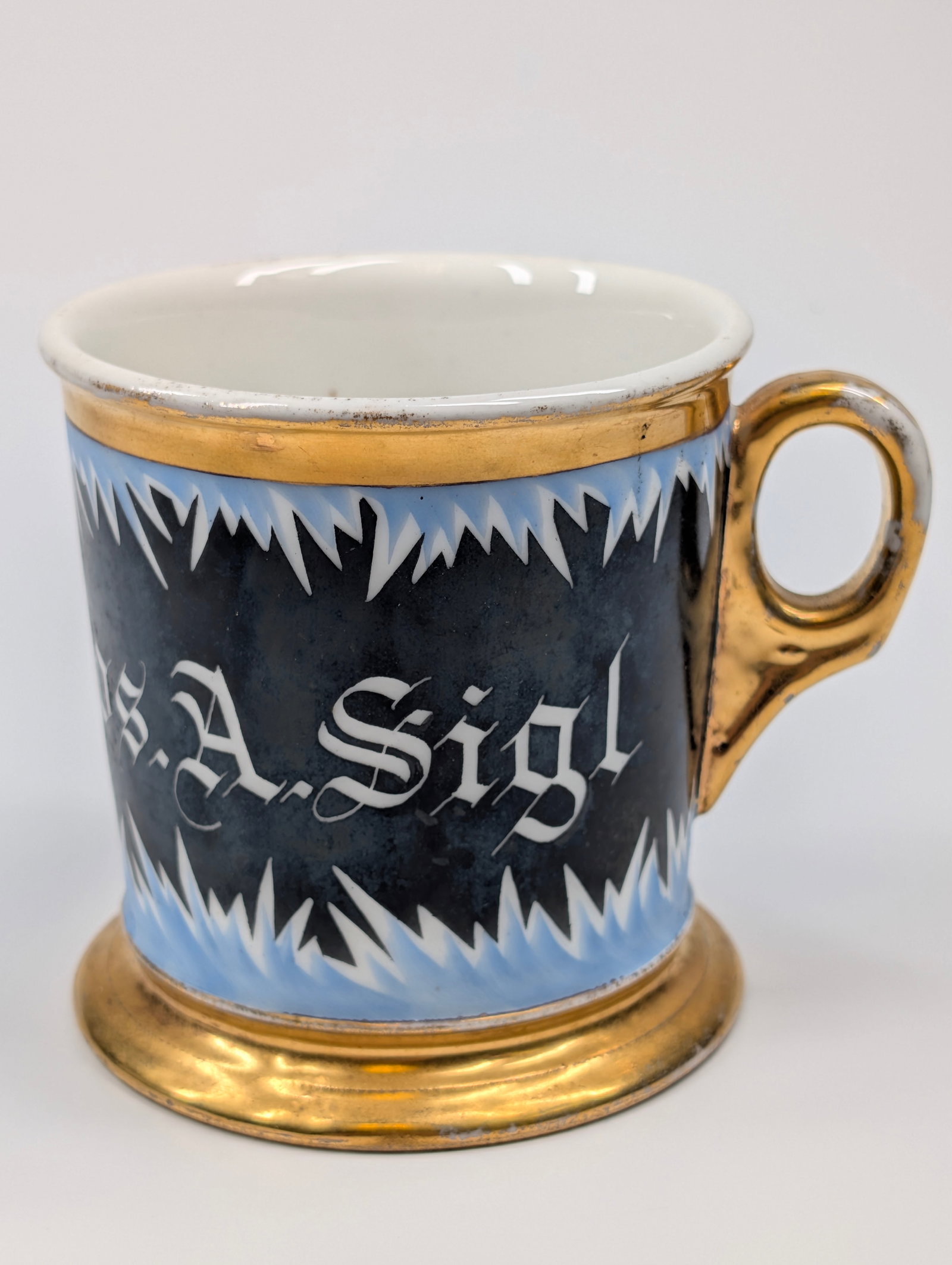 BOLD BLACK KOKEN SHAVING MUG BLUE & GOLD ACCENT: REMAINS IN VERY GOOD CONDITION, SHOWING SOME TYPICAL WEAR.