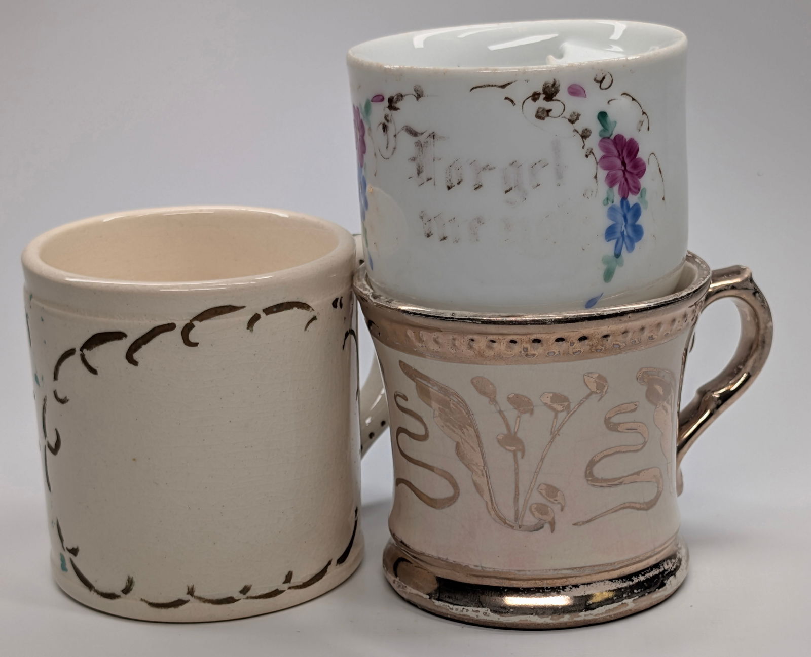 3) MUGS - SILVER DECORATED, MOUSTACHE CUP, SHAVING MUG: REMAINS IN FAIR TO GOOD CONDITION, SHOWING SOME TYPICAL WEAR, DECORATION LOSS, DUST.